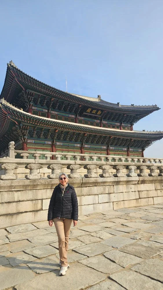 Turkish visitors experiencing the royal guard ceremony at Gyeongbokgung Palace on a tailored private cultural tour.