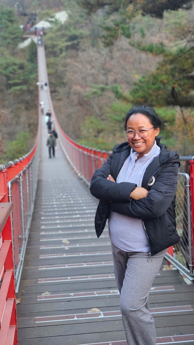Private travel tour for Madagascar guests, panoramic Gamaksan Bridge, misty mountains, serene atmosphere, high-detail image
