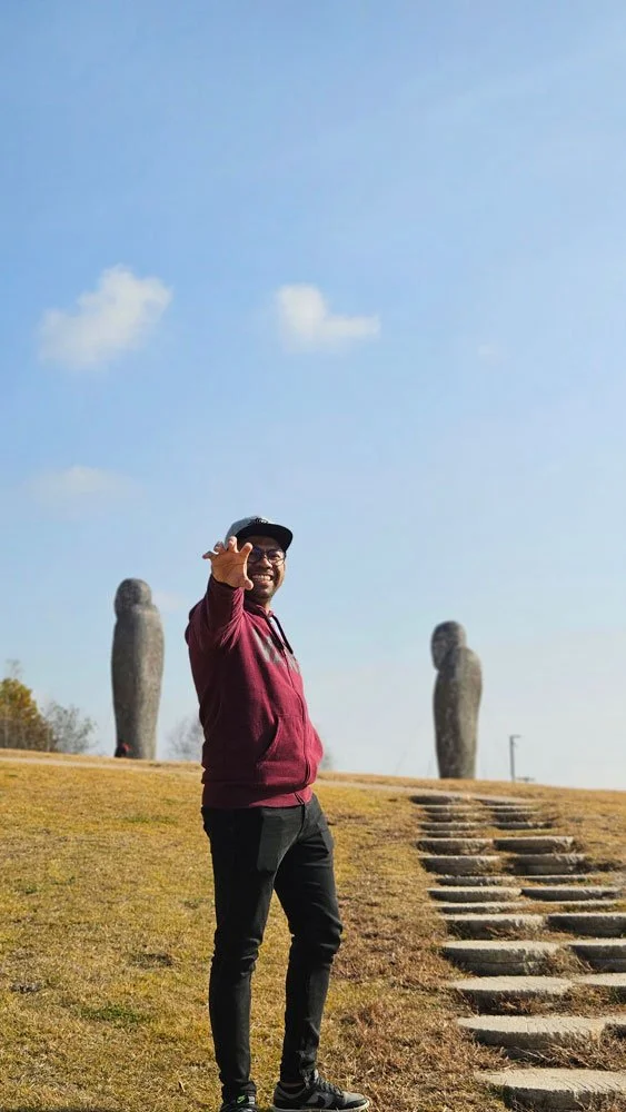 Private tour for Madagascar visitors exploring Pyeonghwa Nuri Park, colorful peace-themed installations, scenic landscape, high-resolution travel image