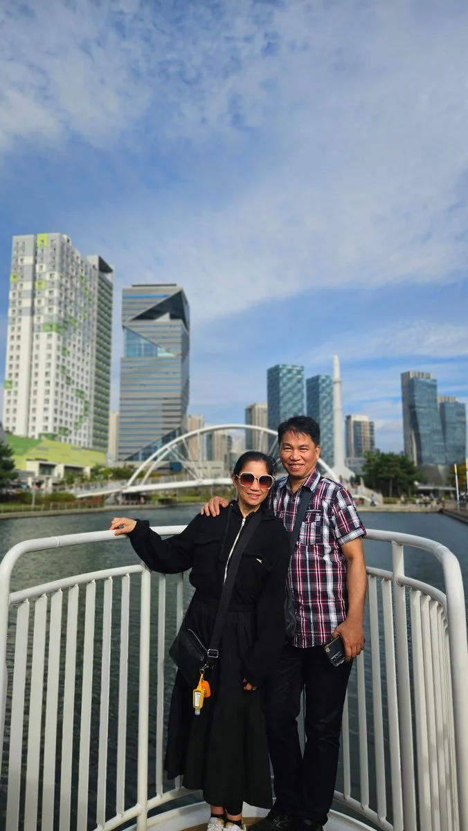 Filipino tourists enjoying a private water boat ride along the canals of Songdo Central Park in Incheon.