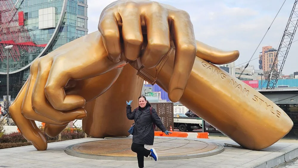 Mexico family visiting the iconic Gangnam Style Statue in Seoul.