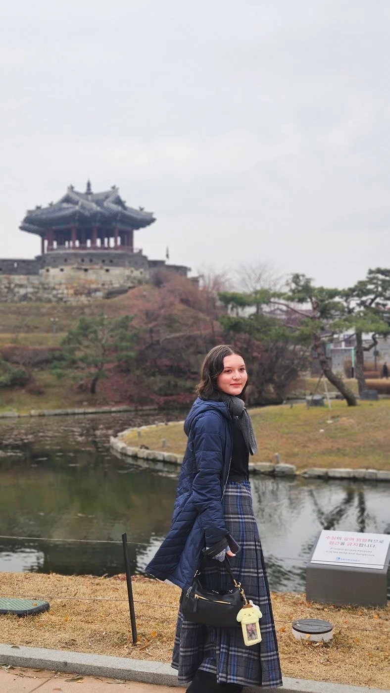 Mexico family experiencing the history of Hwaseong Fortress.