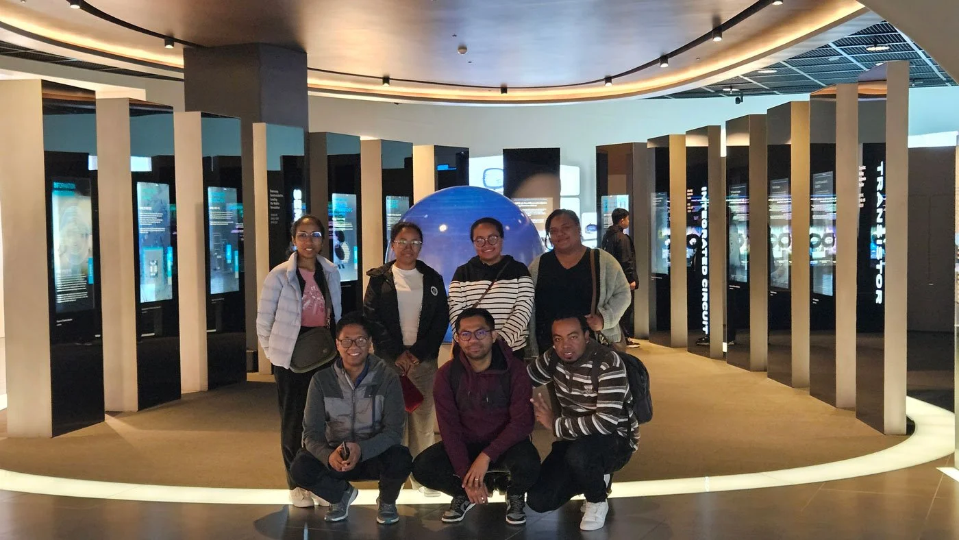 Madagascar travelers on a private tour visiting Samsung Innovation Museum, futuristic technology exhibits, interactive displays, high-resolution professional travel photography