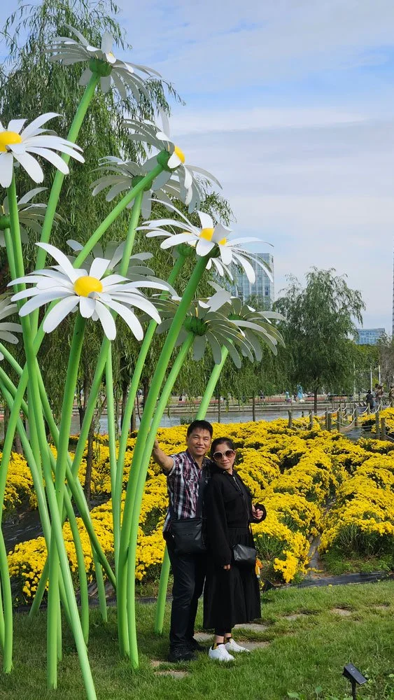 Private guided tour for Filipino visitors exploring the scenic green spaces of Songdo Central Park.