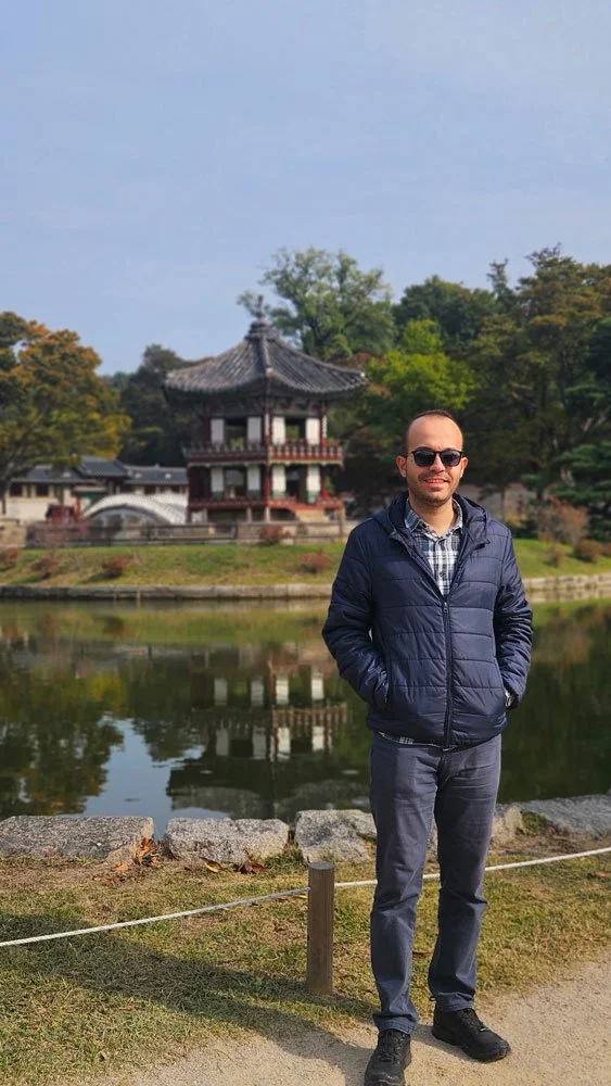 Personalized private tour for Turkish guests exploring Gyeonghoeru Pavilion inside Gyeongbokgung Palace.