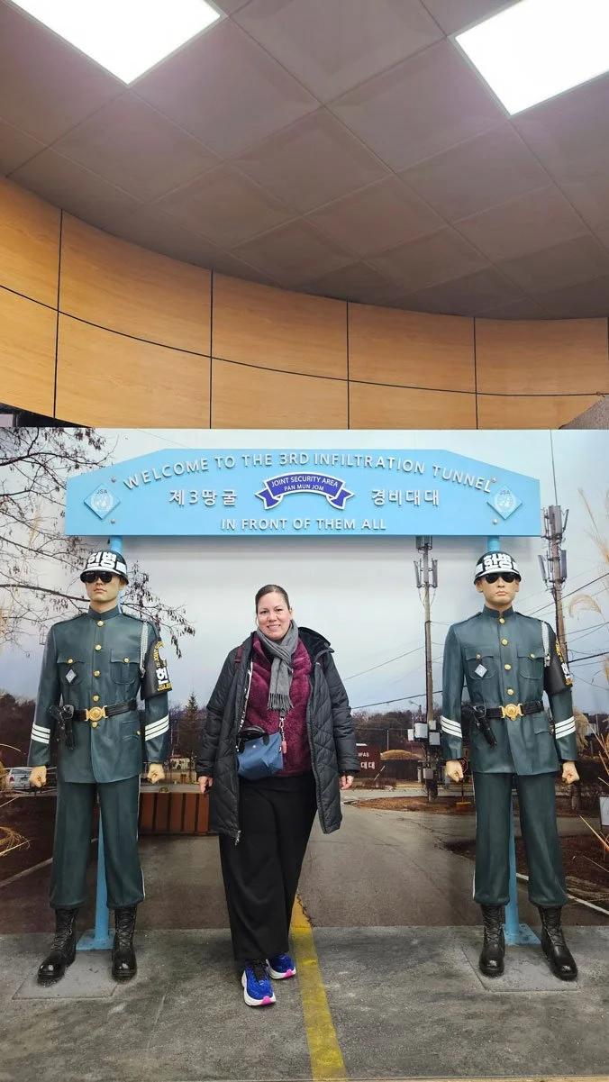 Mexico family exploring the Third Tunnel of the DMZ on a guided tour.