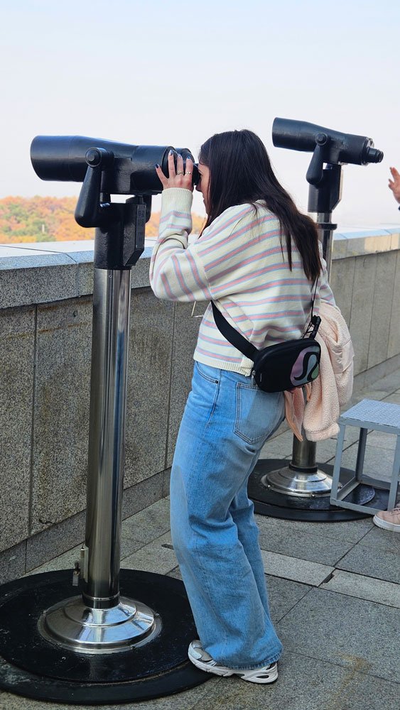 Australian visitors learning about Korea’s division at the Odusan Unification Observatory exhibition hall.