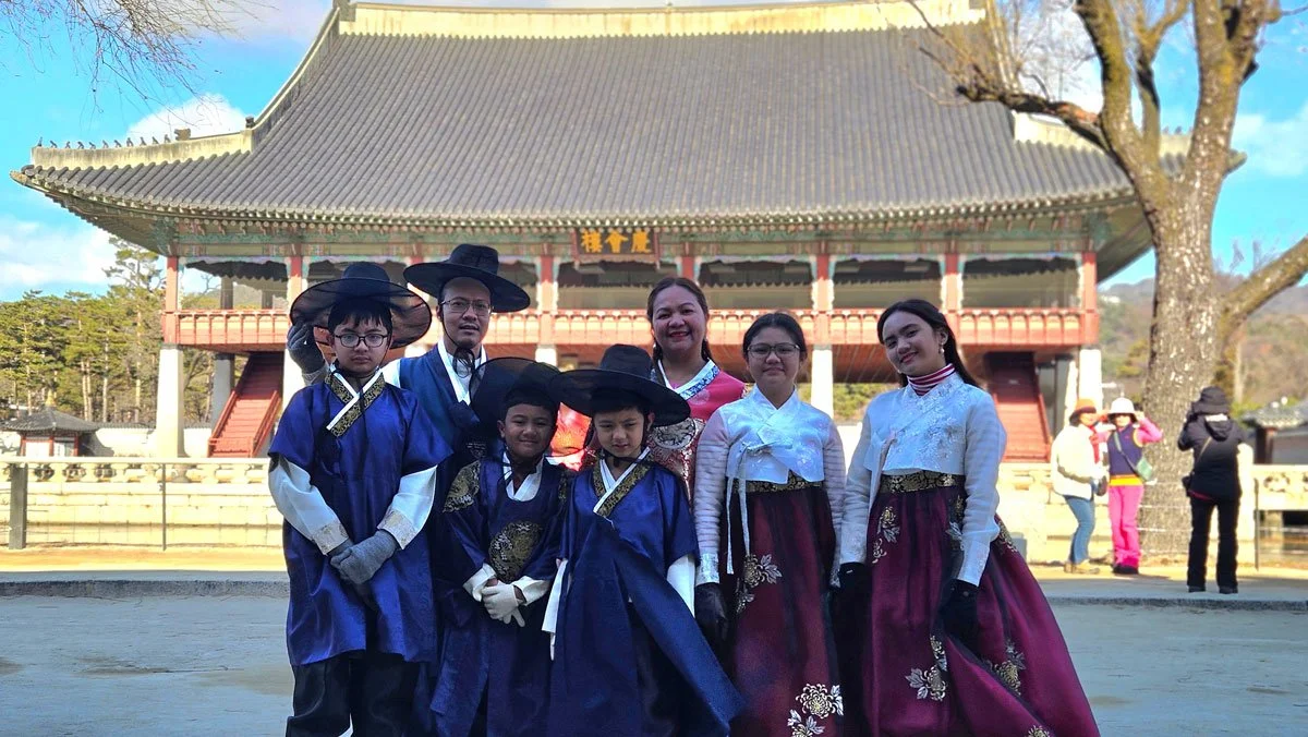 Philippine family visiting Gyeongbokgung Palace on a private tour