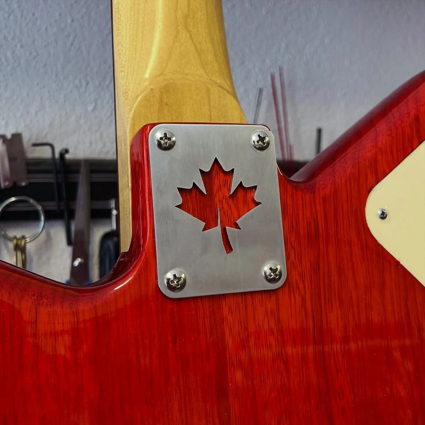 Every Earthly guitar tells its story, even in the smallest details. These custom neck plates with the maple leaf cut are more than functional &mdash; they showcase the wood and finish of each build, adding a timeless signature touch to every instrume