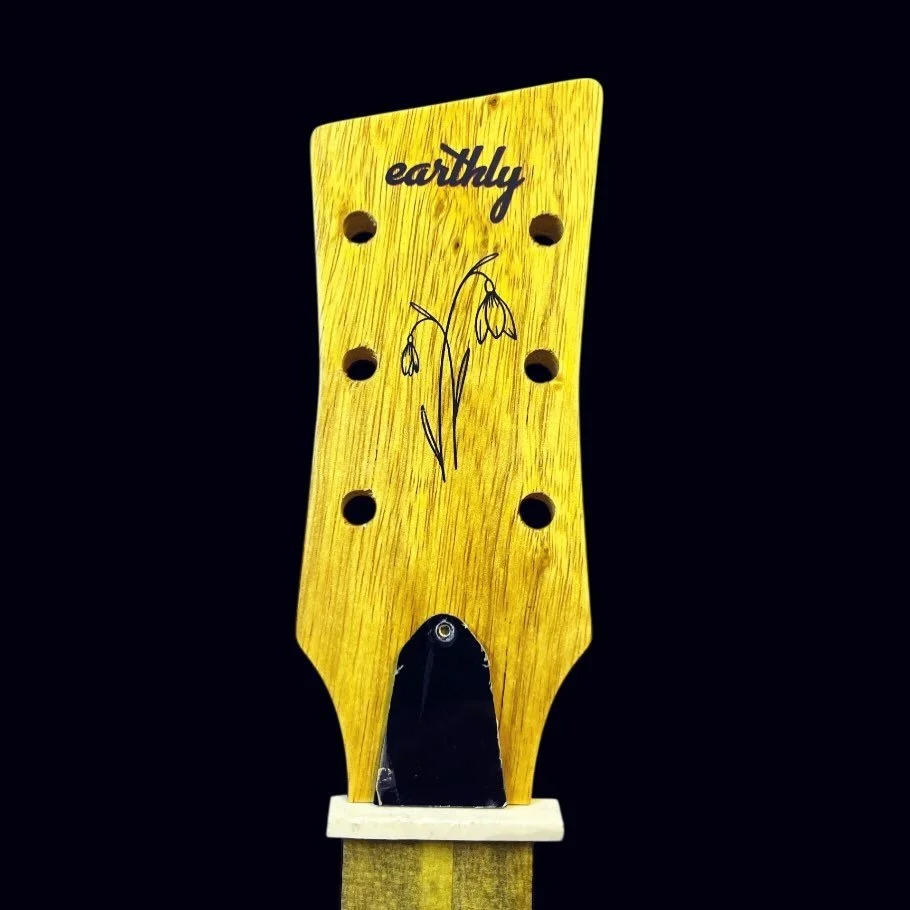 The Kardelen decal rests beneath vintage amber, floating over the grain like the first bloom after winter. A quiet detail, sealed in satin nitro, letting the korina speak while the symbol remains.

Subtle. Personal. Enduring.

Place your custom order