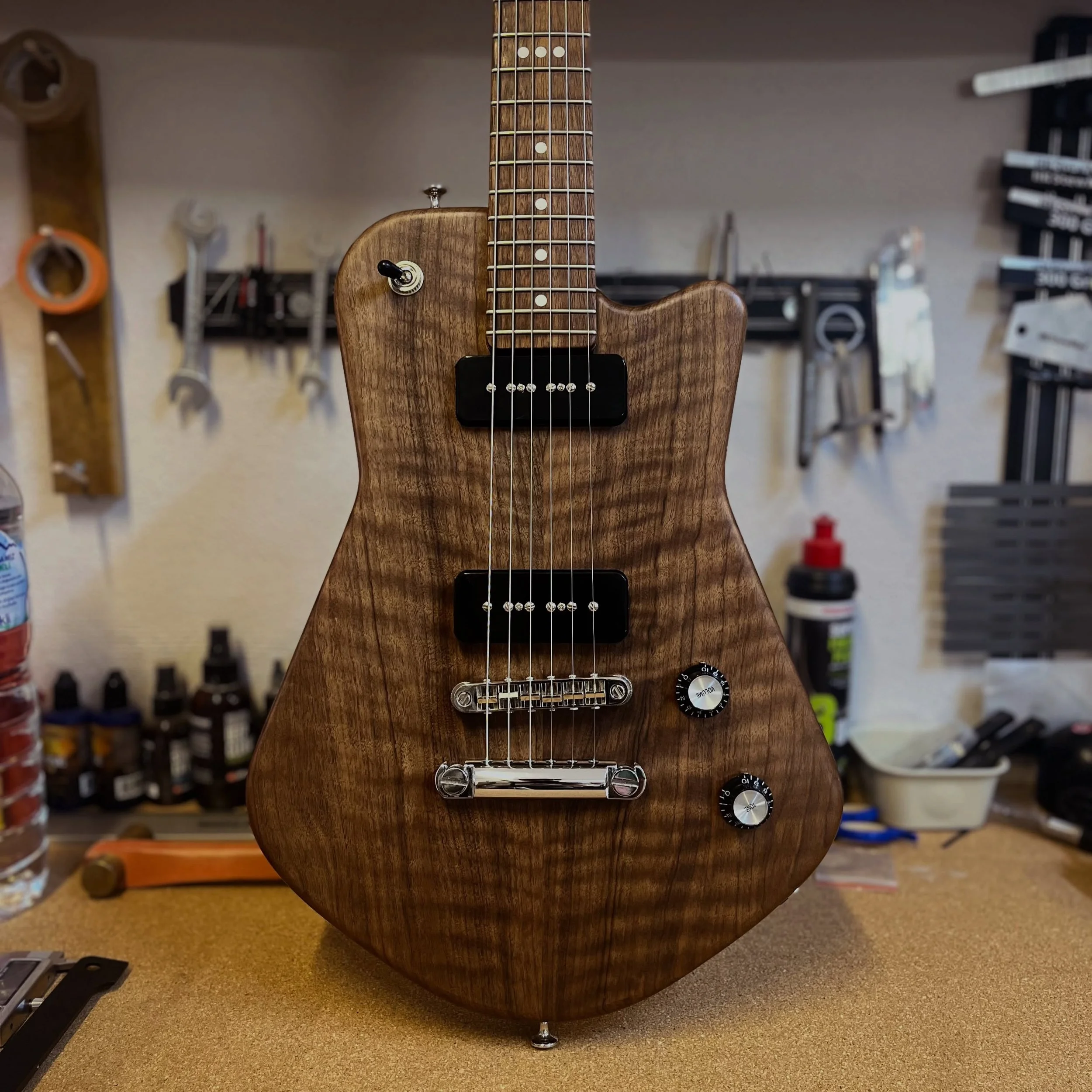 ON SALE - Korina body, flame walnut top, birdseye maple neck, ovangkol fretboard, and a pair of vintage voiced Alnico2 P90s built to let the wood speak. Every detail has been shaped, refined, and dialed in by hand&mdash;from the first cut to the fina