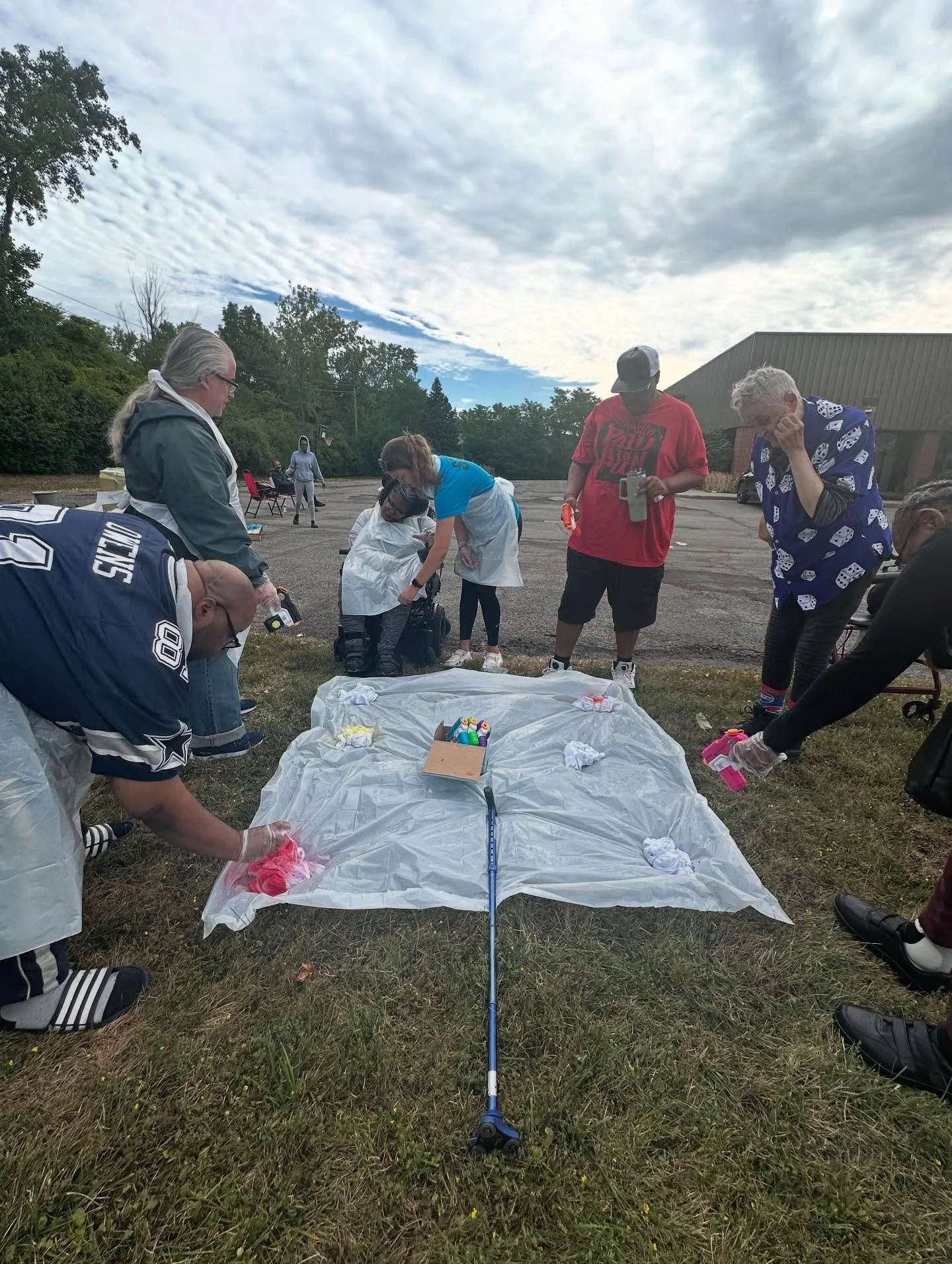Water gun tie-dye!!! 
What a beautiful day it was for this fun outside activity! We loaded water guns with tie-dye colors and participants decorated their own shirts! Everyone was so creative and made their shirts their own!