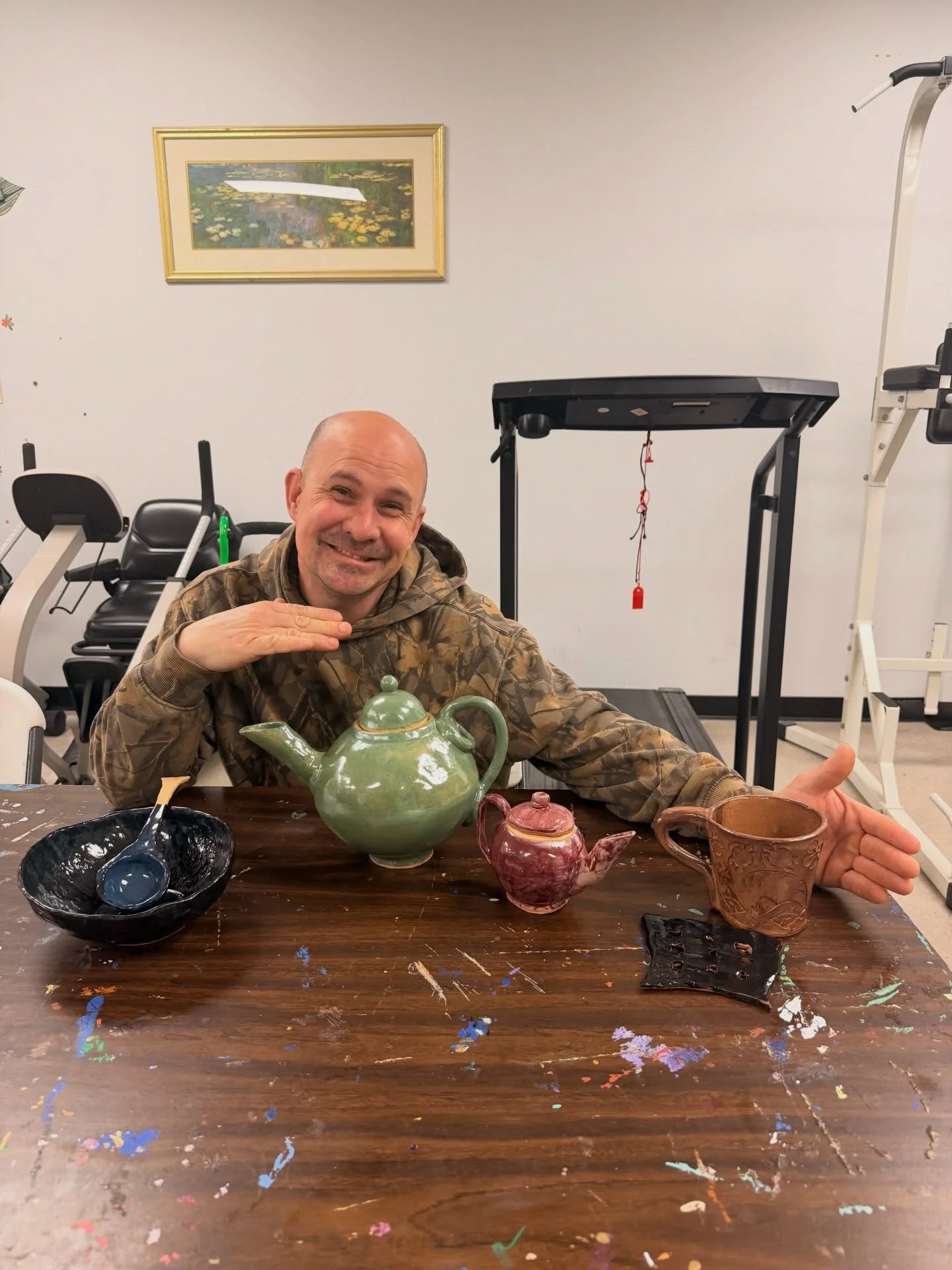This morning, participant Thano brought in some of his pottery from home for everyone to see! His collection included a mug, two teapots, a trivet, and a bowl with a serving spoon which are all handmade and glazed by him.

We love when participants b