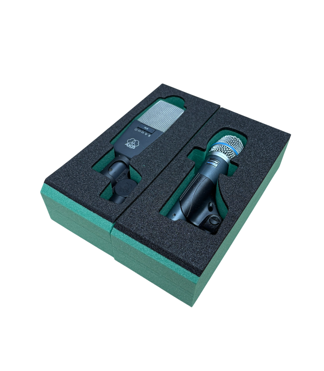 A boxed set of two microphones, one with a large grille and the other with a smaller grille, securely nestled in black foam packaging.