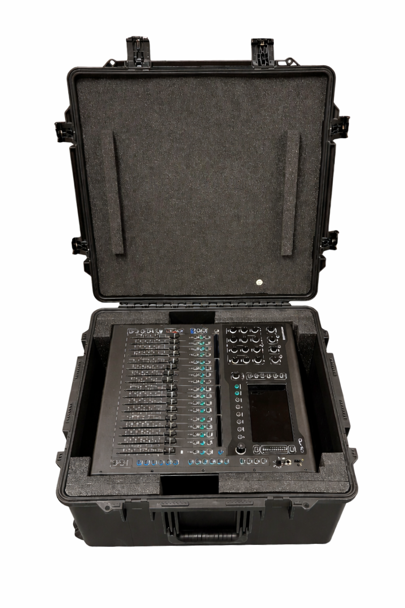 Open black briefcase containing a digital audio mixing console with various sliders, knobs, buttons, and a display screen.