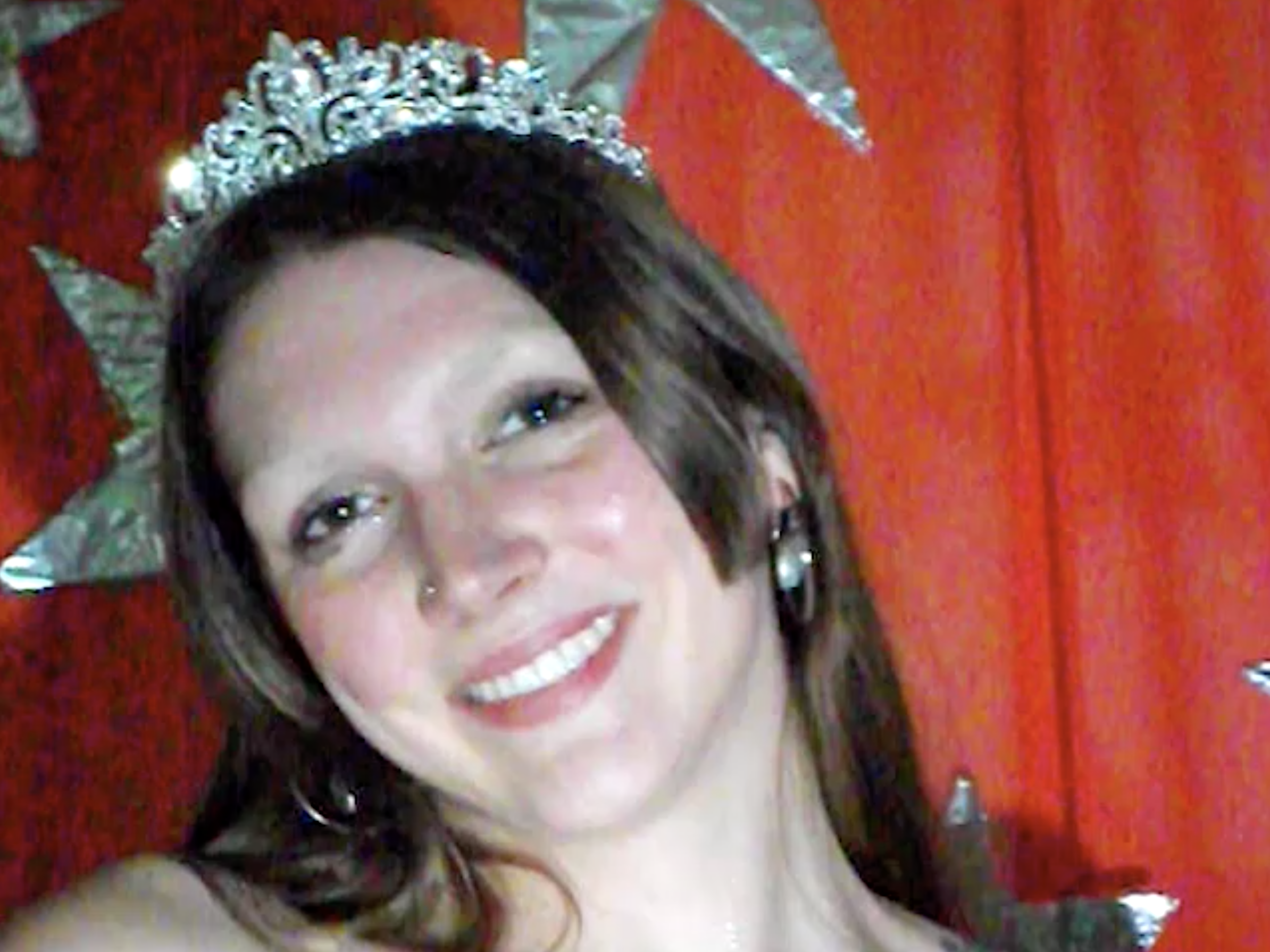 Stills taken from American Sweetheart. Hand-Dyed Organic Cotton and Tulle Dress with Feather Trim. 2026. Creative direction by Madeline Hansen. Filmed by Yaya Teng. Full video can be watched by clicking on image above.