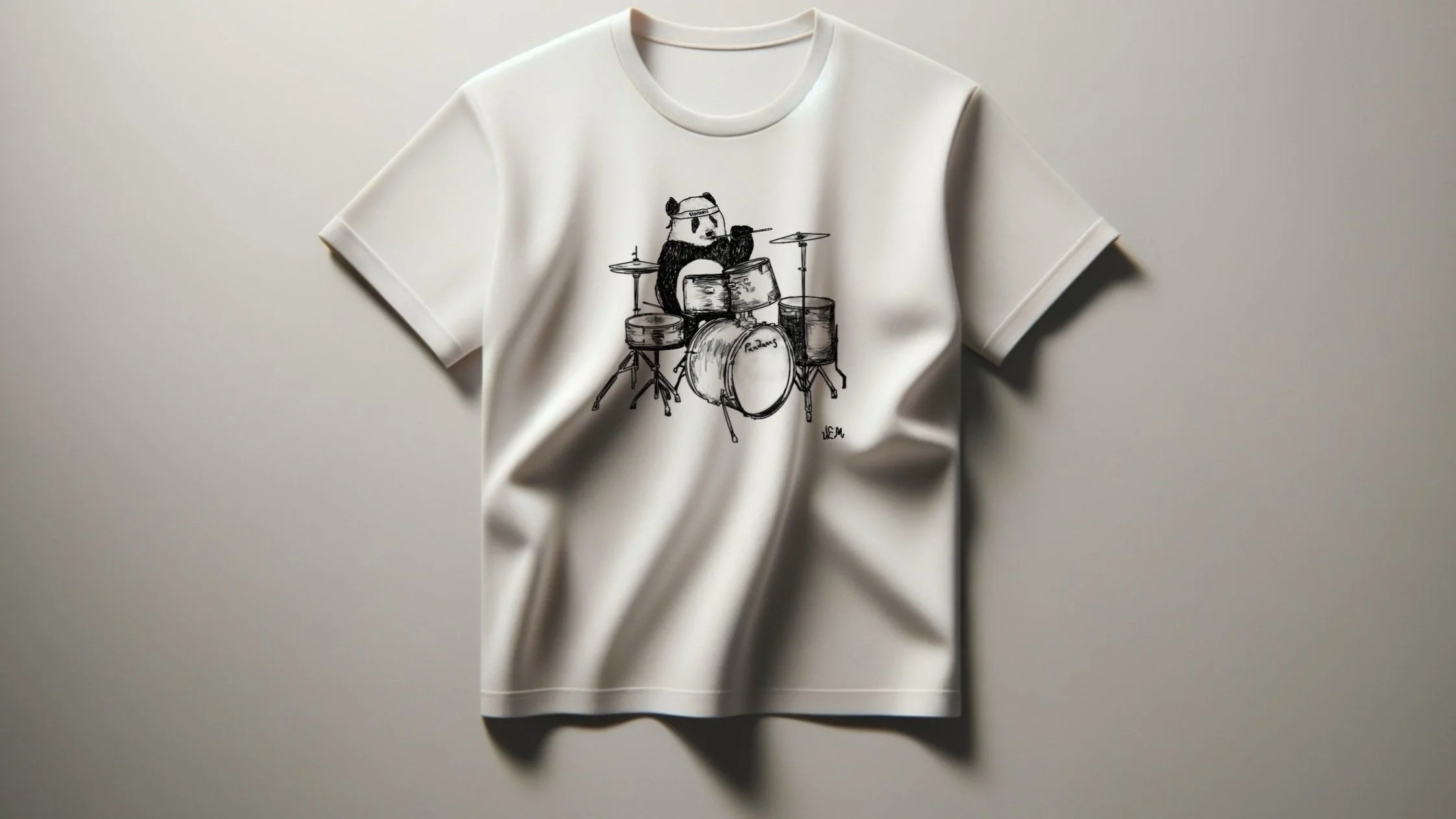 White T-shirt with a black line drawing of a panda playing drums.