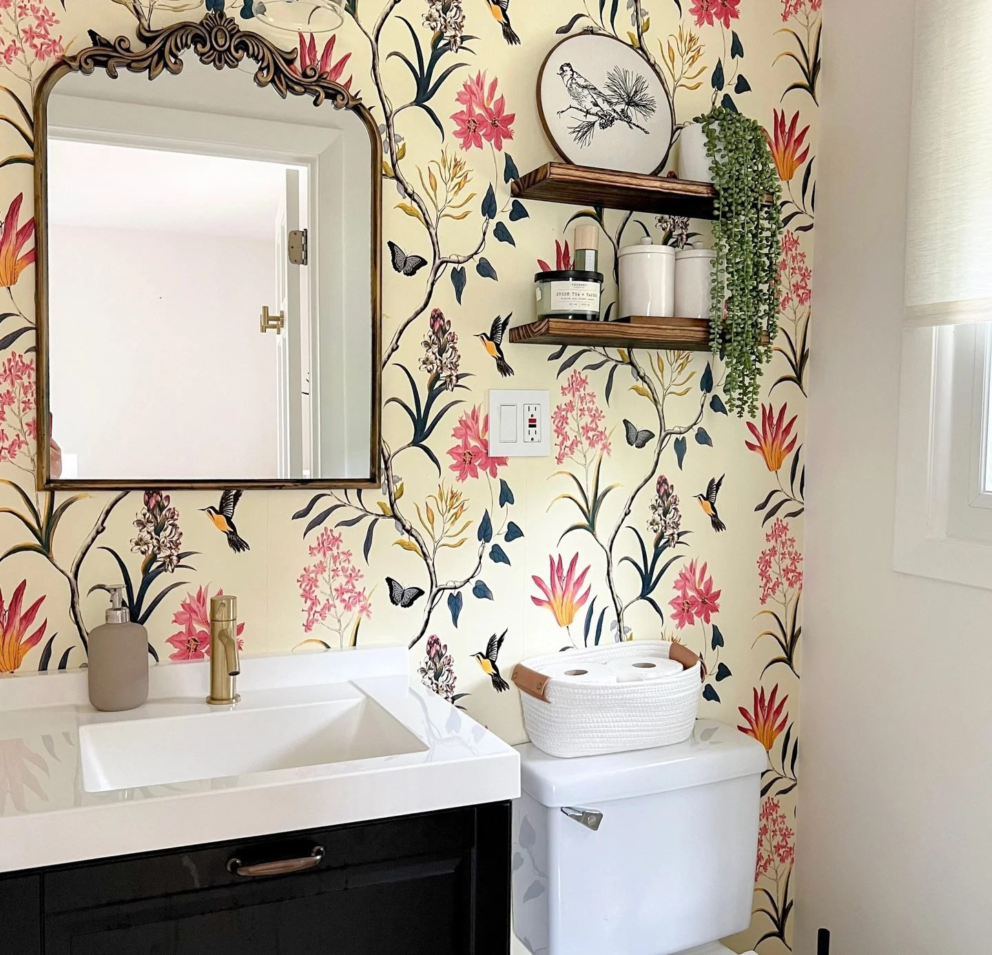 One of my favorite bathrooms ✨
Proof that a small space can make a big impact.

Wallpaper + new vanity, lighting, mirror, shelves, and simple decor (HomeGoods finds!) completely transformed this powder room.

Who&rsquo;s ready for a bathroom refresh?