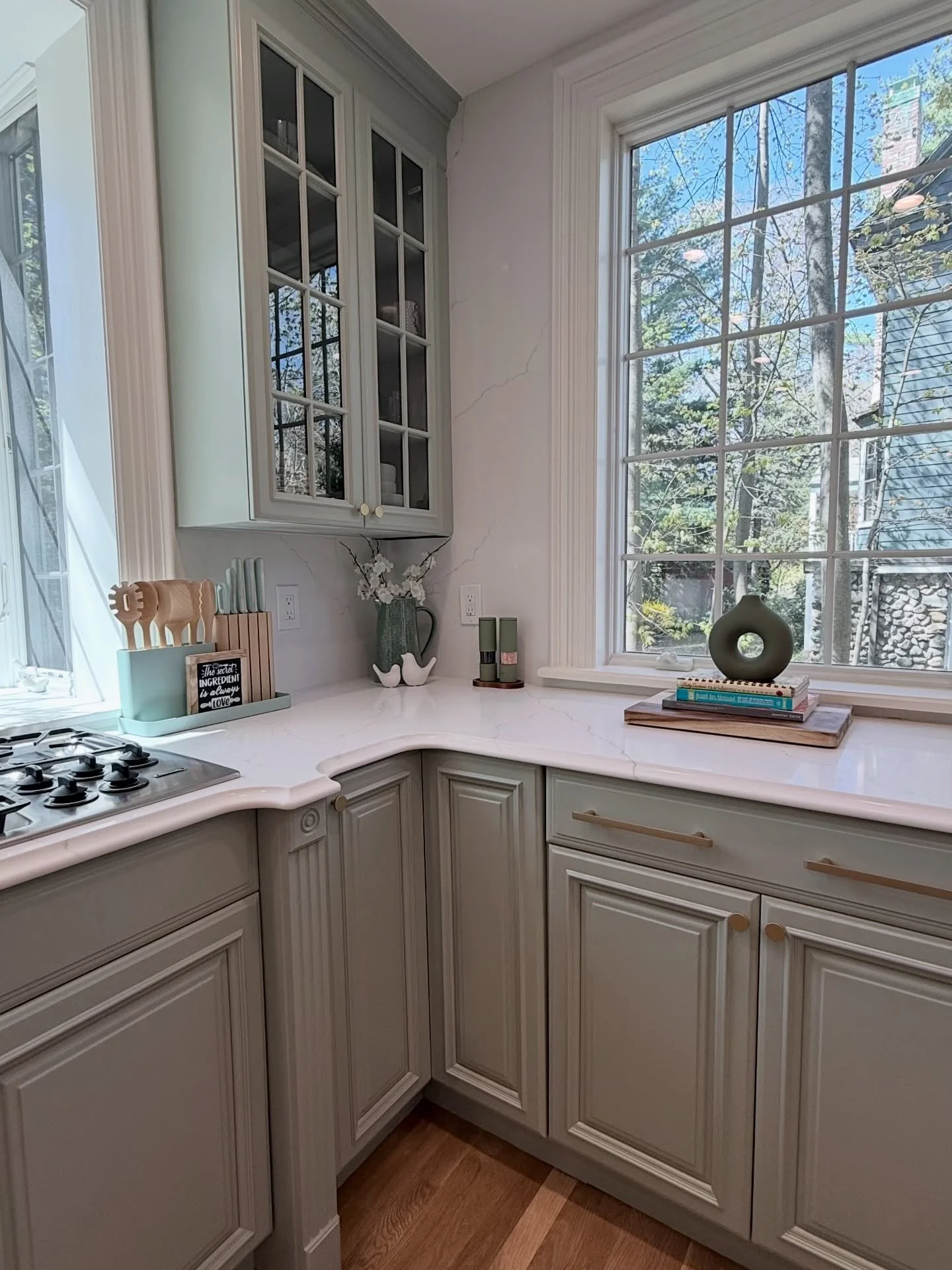 The power of paint, new countertops and backsplash. 
I couldn&rsquo;t be more happier with how it&rsquo;s turned out, the kitchen looks so calm, cosy, and fresh now.

The paint color is Saybrook Sage @benjaminmoore Moore. 

Swipe to see the before 👀