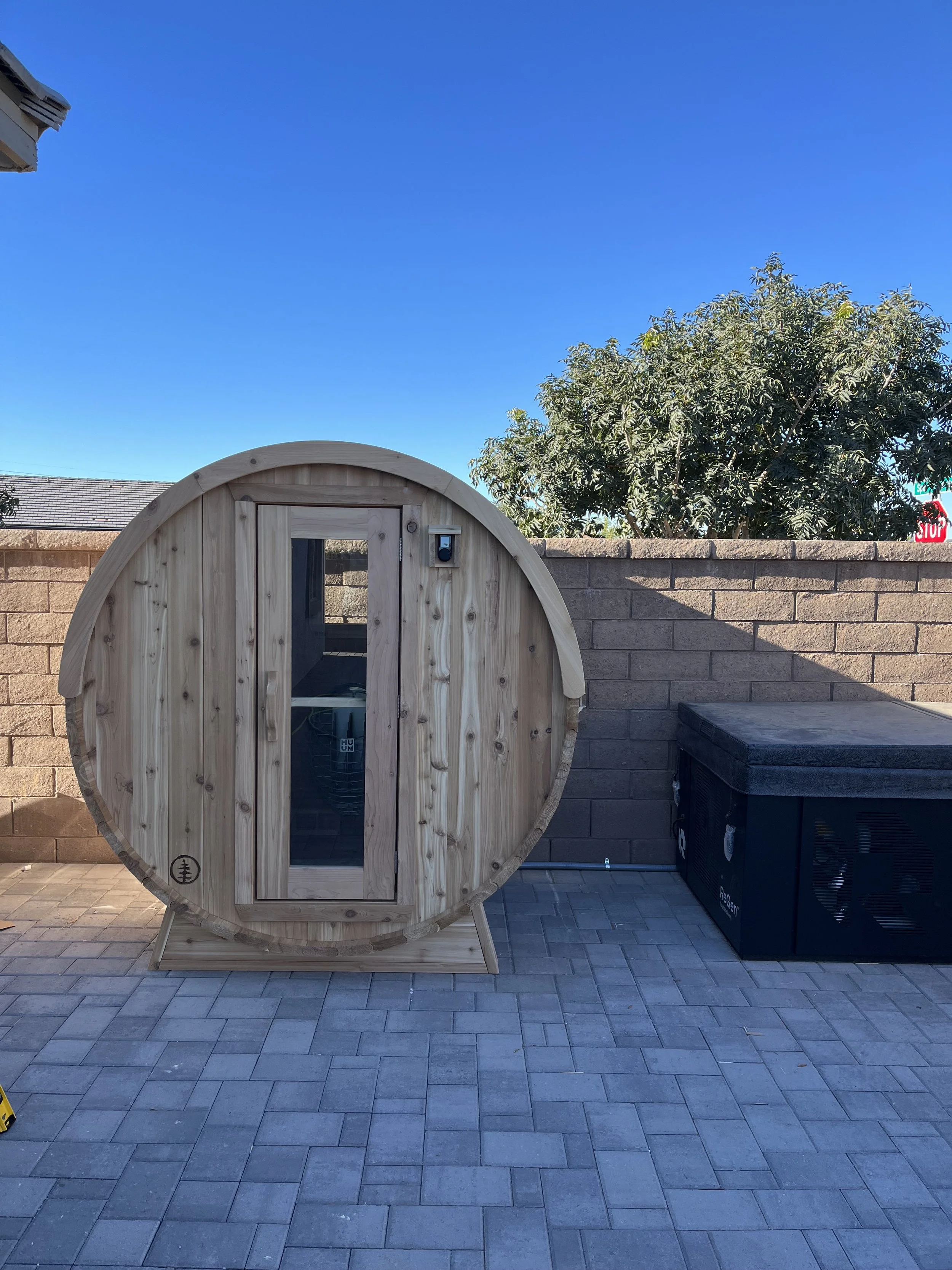 Oranssi technician working on a roof project