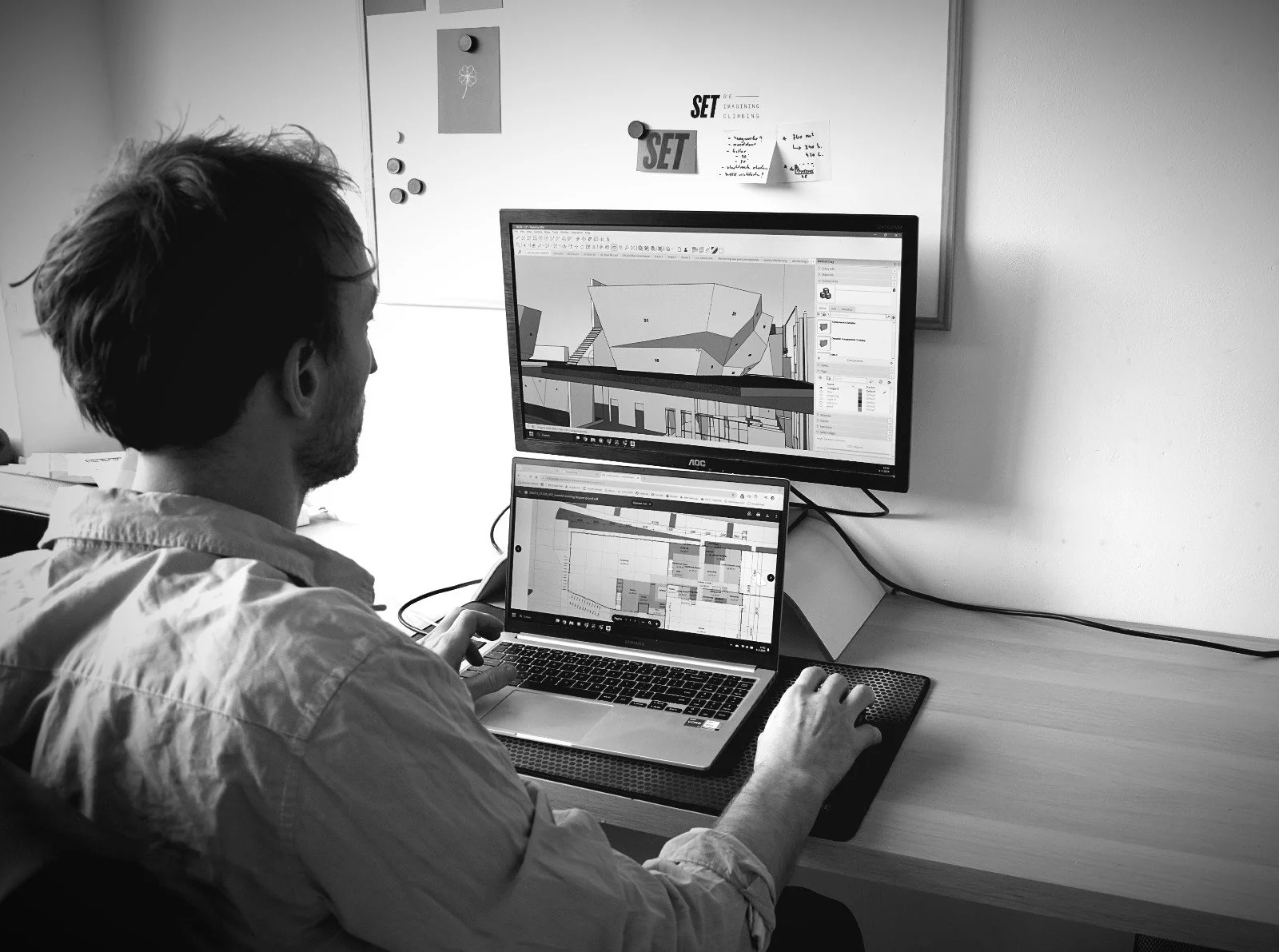 In-house designer drawing climbing walls