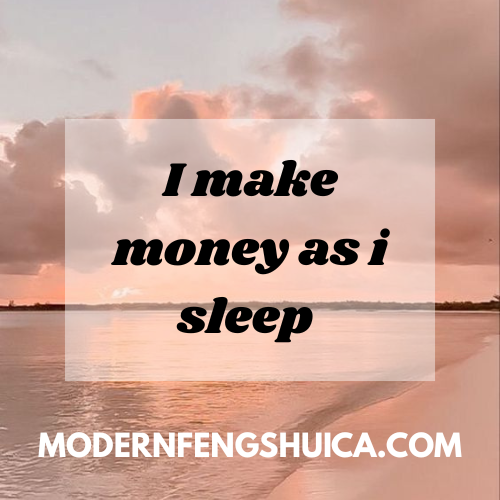 A scenic beach with a calm body of water, cloudy sky at sunset, and an overlay text that says 'I make money as I sleep' with a website URL modernfengshui.ca.
