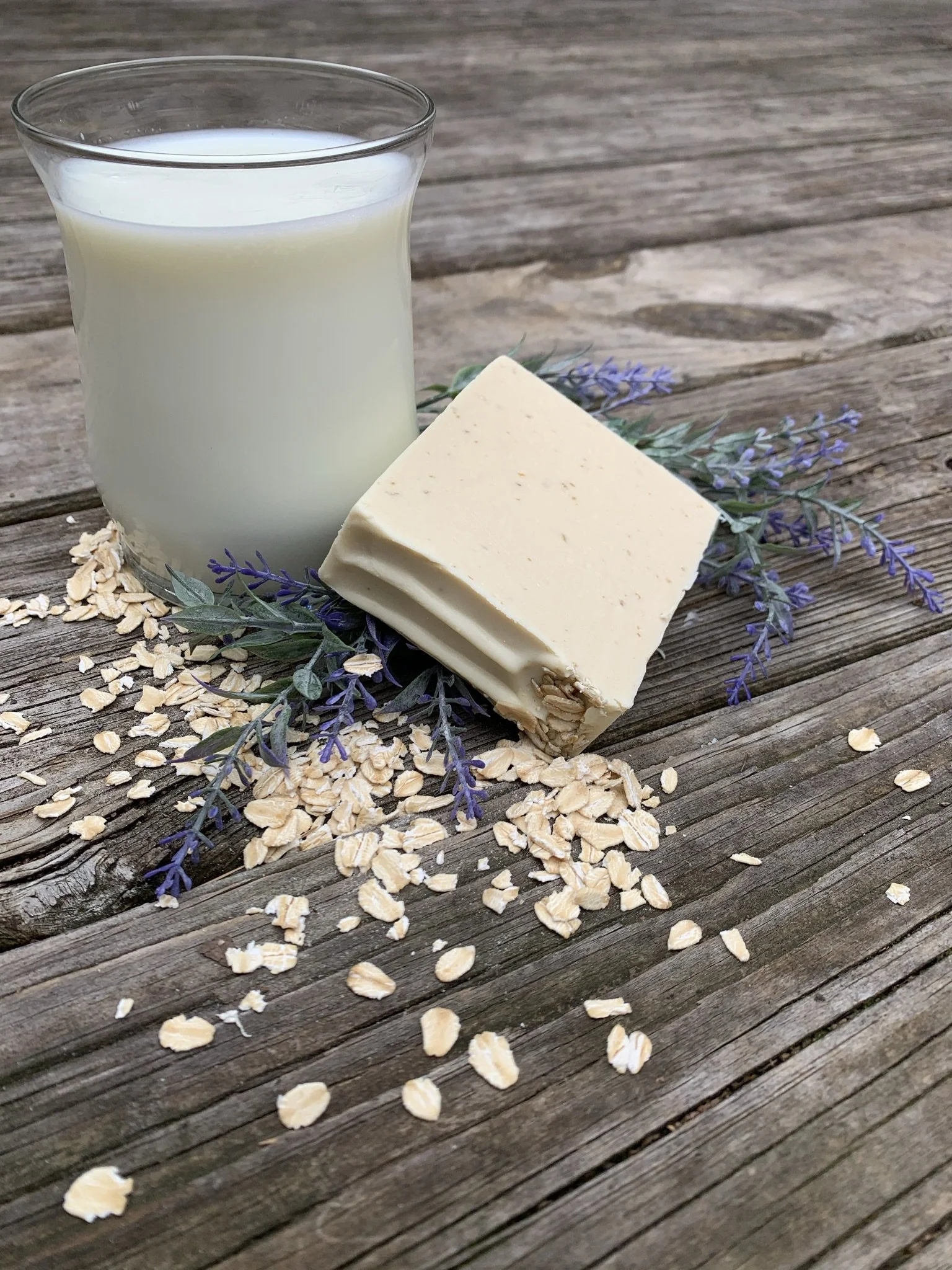Oat Milk, Oats & Lavender Soap Bar a calming, creamy bar made with oat milk, ground oats, and lavender essential oil. Gently exfoliates and soothes sensitive skin while leaving a soft, relaxing scent.