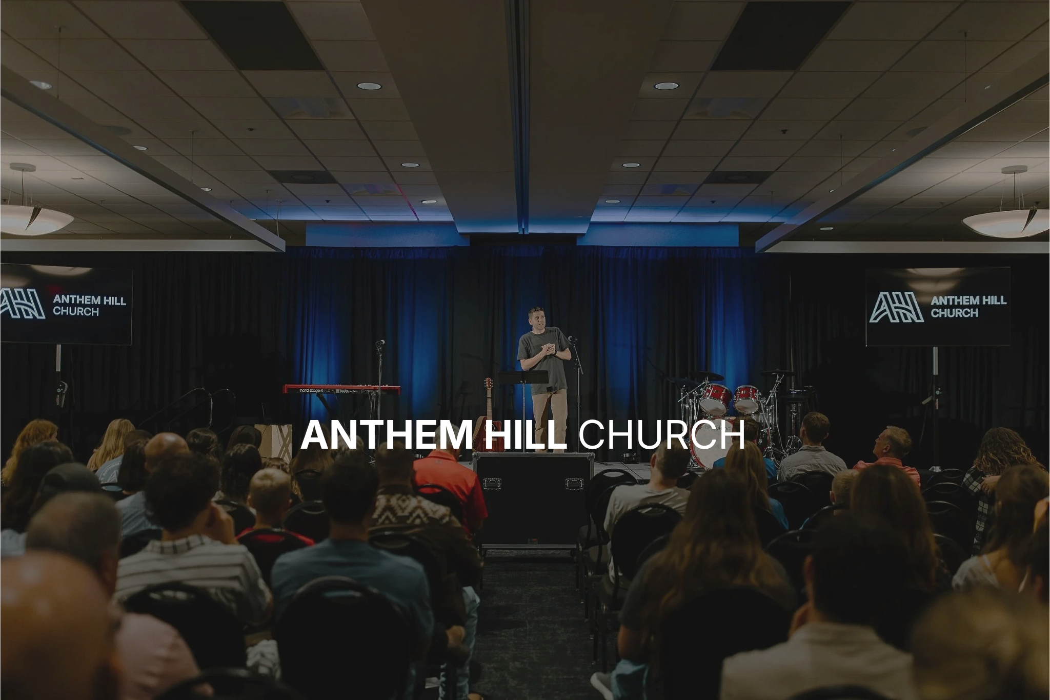 pastor preaching to a congregation in Bowling Green, KY at a church