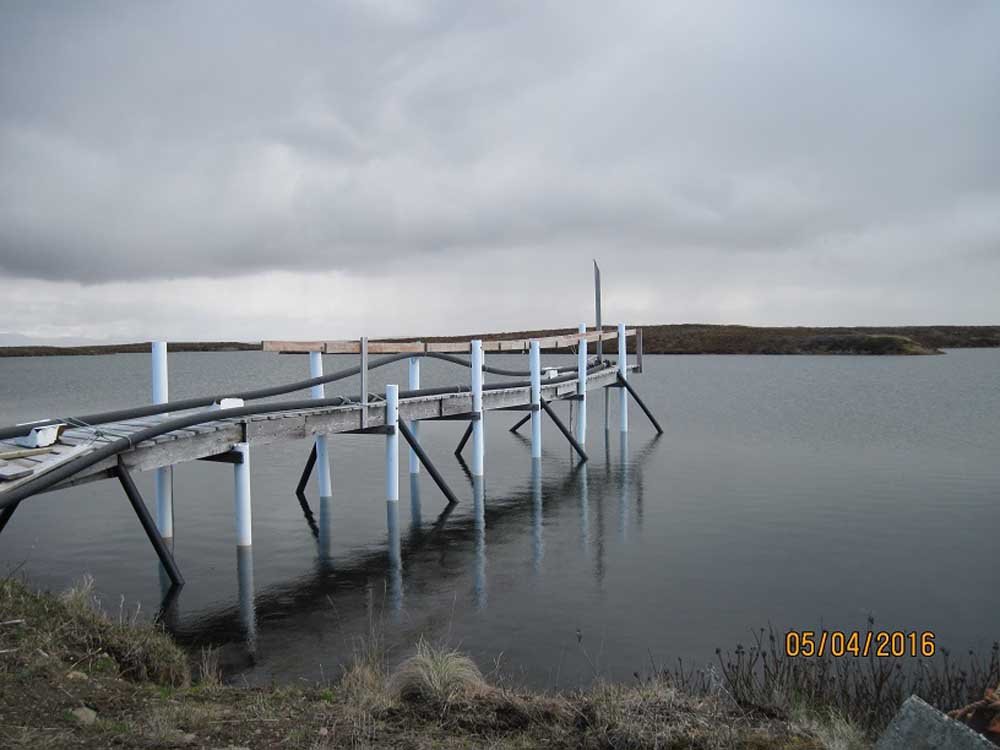 The community's drinking water pump. The pump has to be repaired frequently due to erosion.