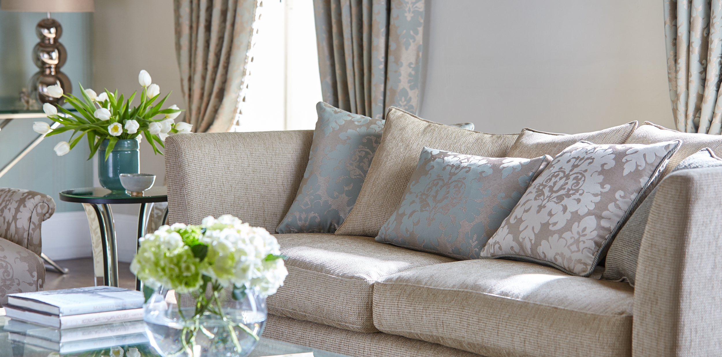 Snow-capped mountains under a cloudy sky