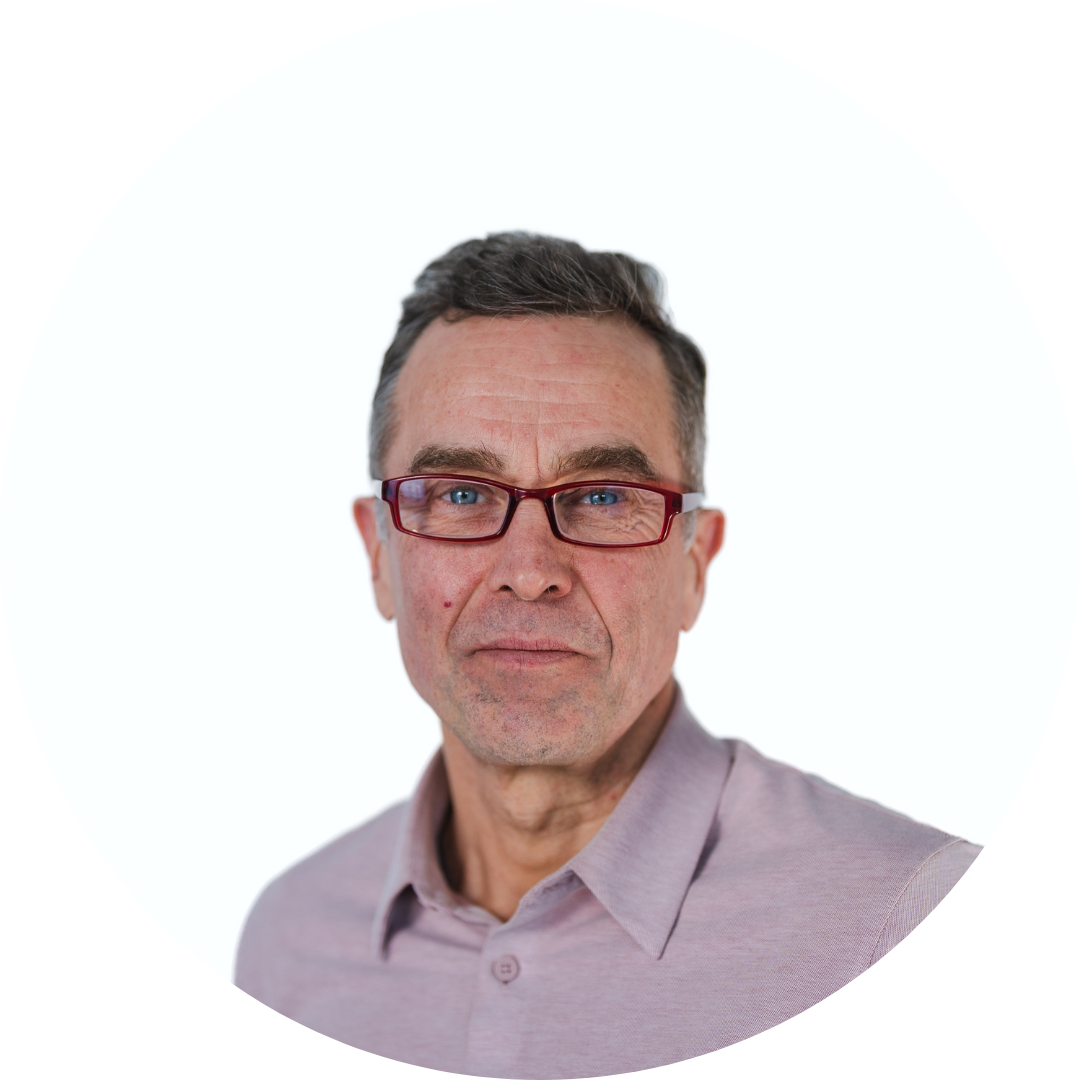 Portrait of a smiling man in a collared shirt