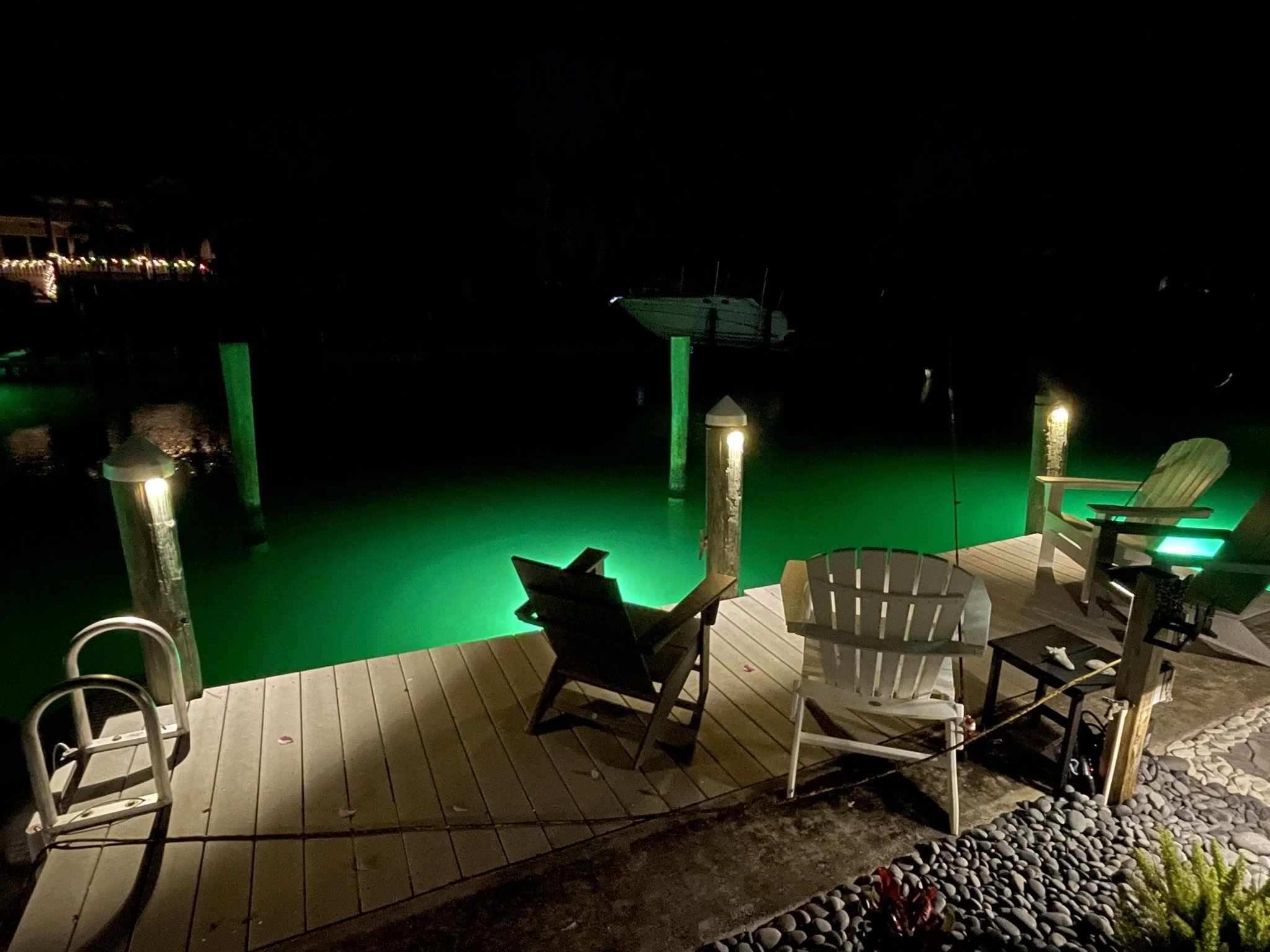 Professional dock lighting installation on a waterfront property in Sarasota, Florida