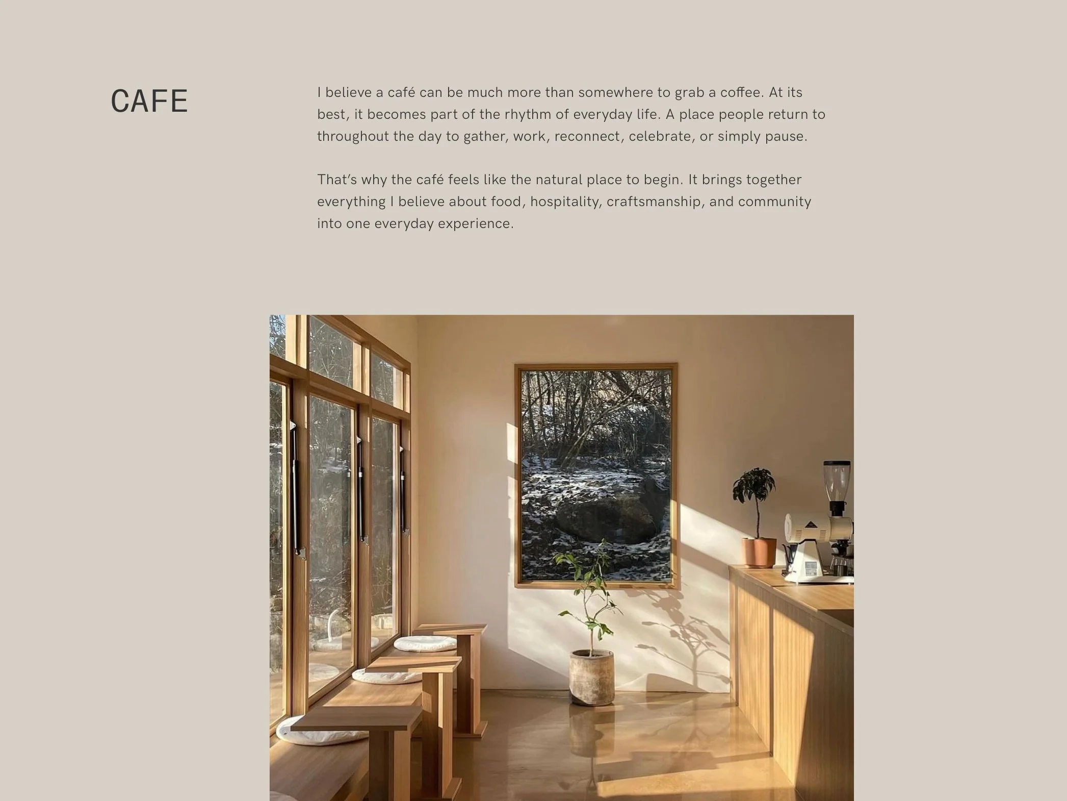 A cozy room with large windows bringing in natural sunlight, decorated with a potted plant, a wooden bench, and a small countertop with a coffee machine. The view outside shows snow-covered ground and trees.