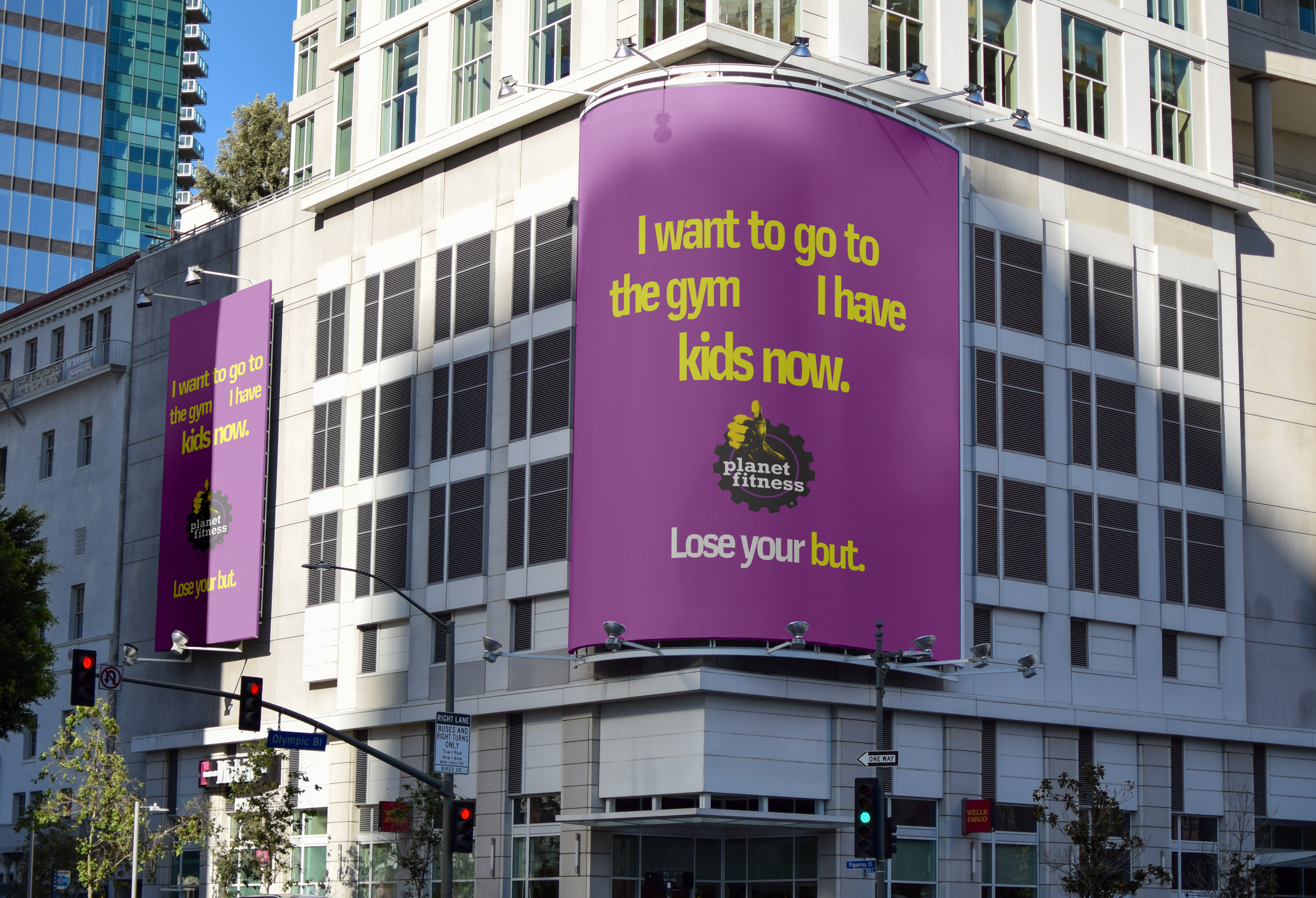 Large, purple Planet Fitness Outdoor Billboard on building in the city.