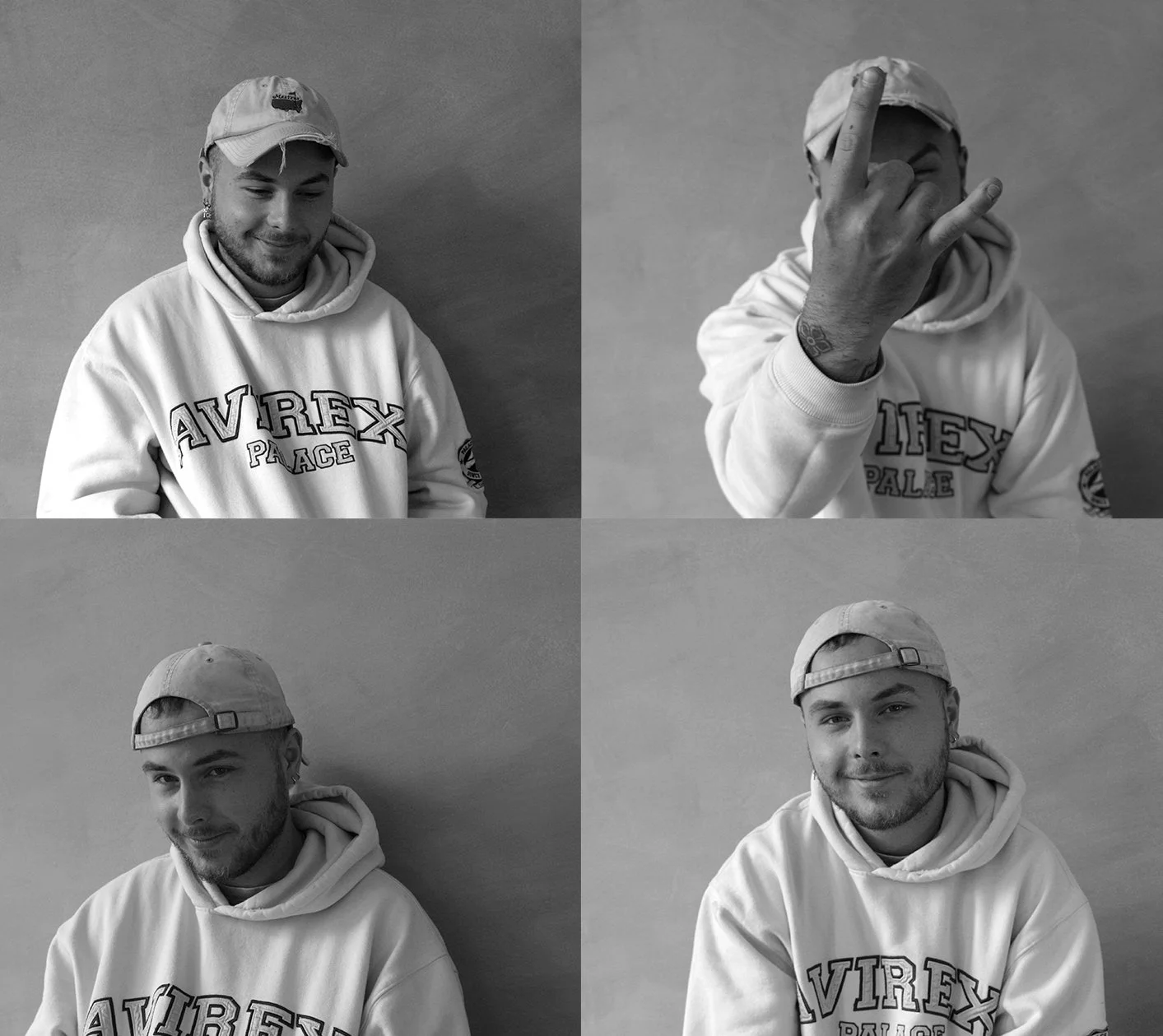 A collage of four black-and-white photos of a young male tattoo artist wearing a hoodie and a cap, showing different facial expressions and hand gestures against a plain wall background.