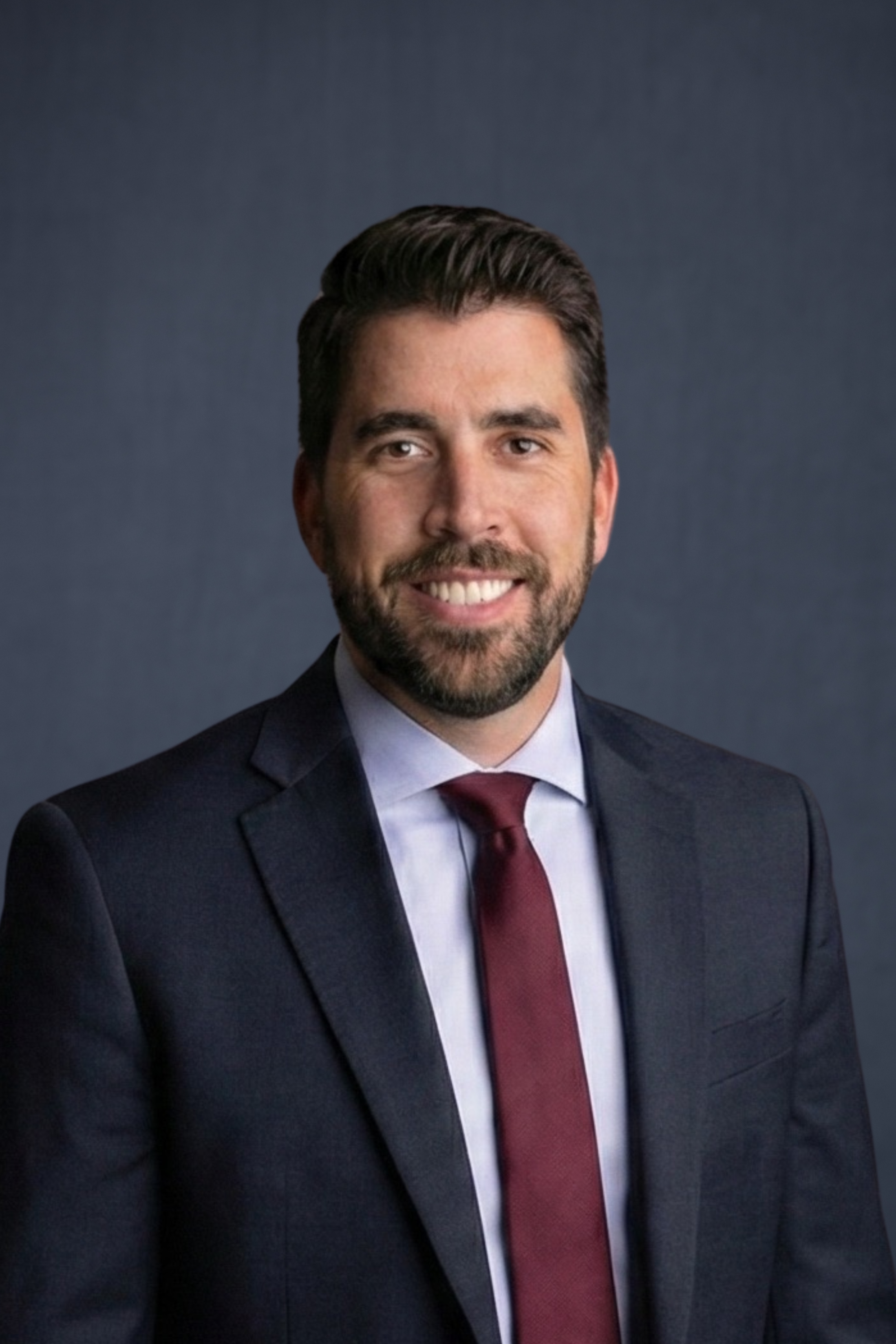 TRAVIS E. BREWER