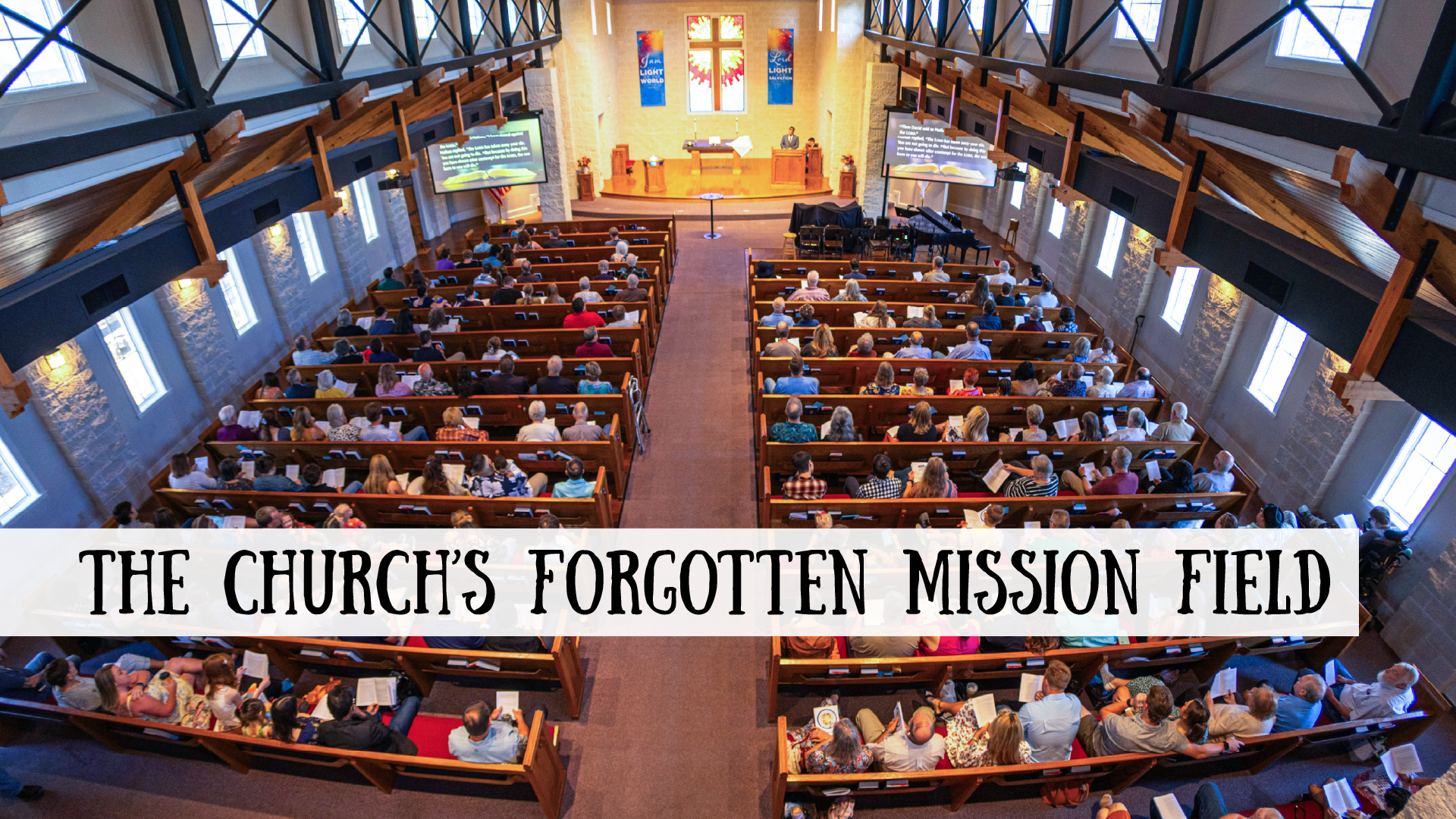 A church with pews full of people and a stained glass window at the front, titled: "The Church's Forgotten Mission Field"