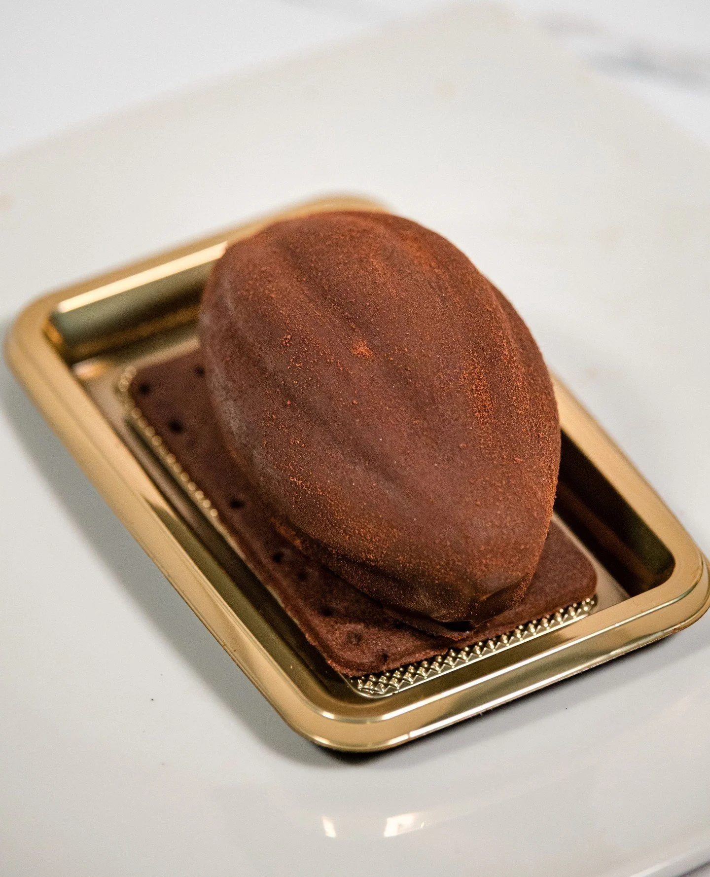 The Cacao is bold, elegant, and unapologetically chocolate. Everything a pastry should be.