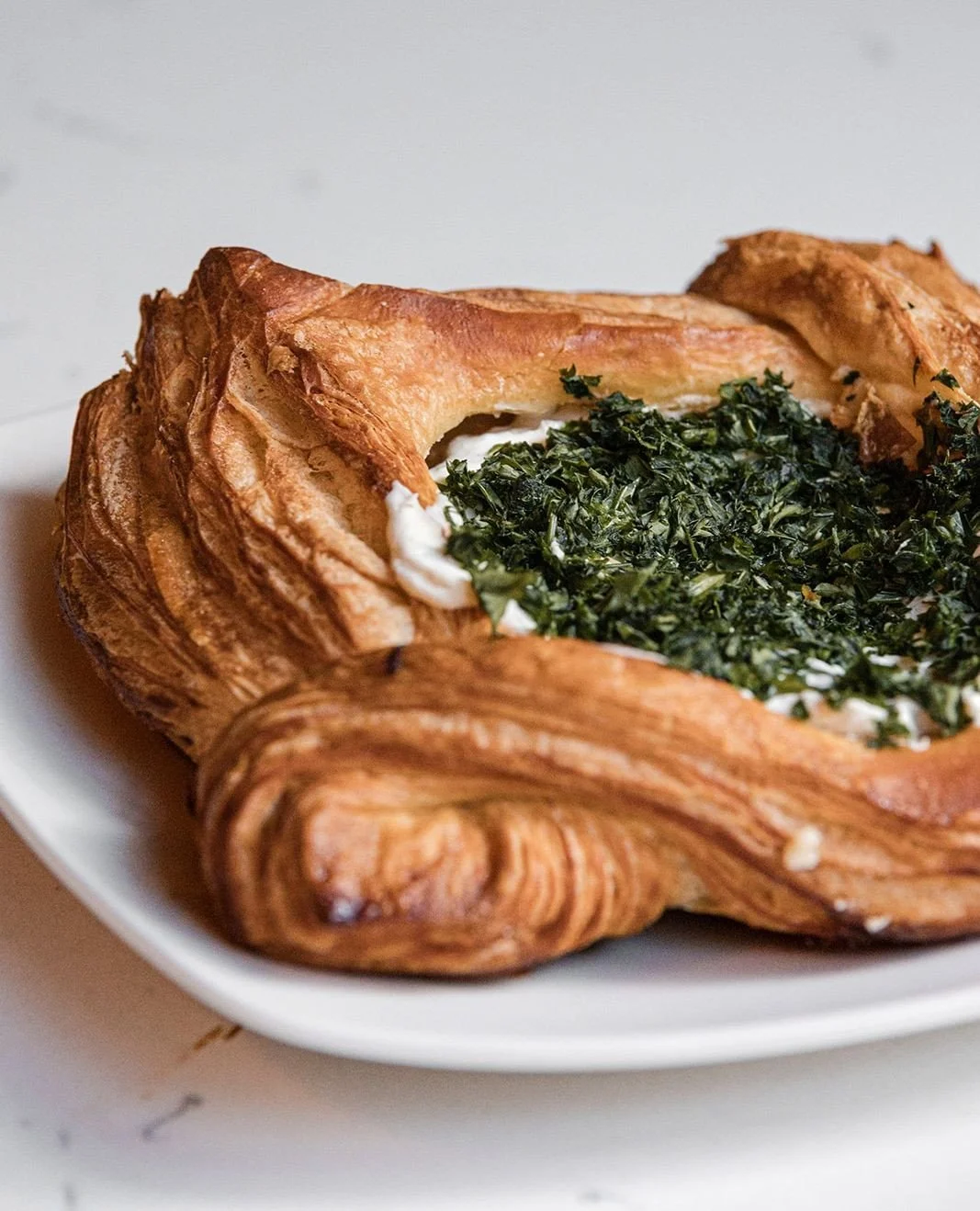 Laminating dough is both science and art.⁠
⁠
Every fold creates the flaky layers that make a croissant unforgettable. What looks effortless on the outside takes patience, precision, and countless early mornings behind the scenes.⁠
⁠
And yes &mdash; i