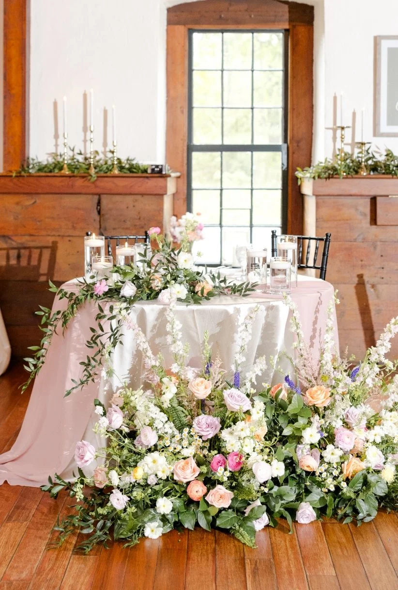 Beautiful floral covered sweetheart table