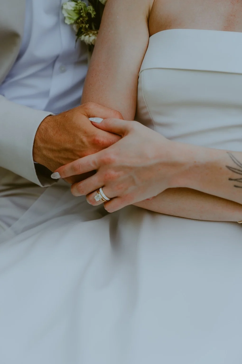 Couple wedding rings at stone mill inn