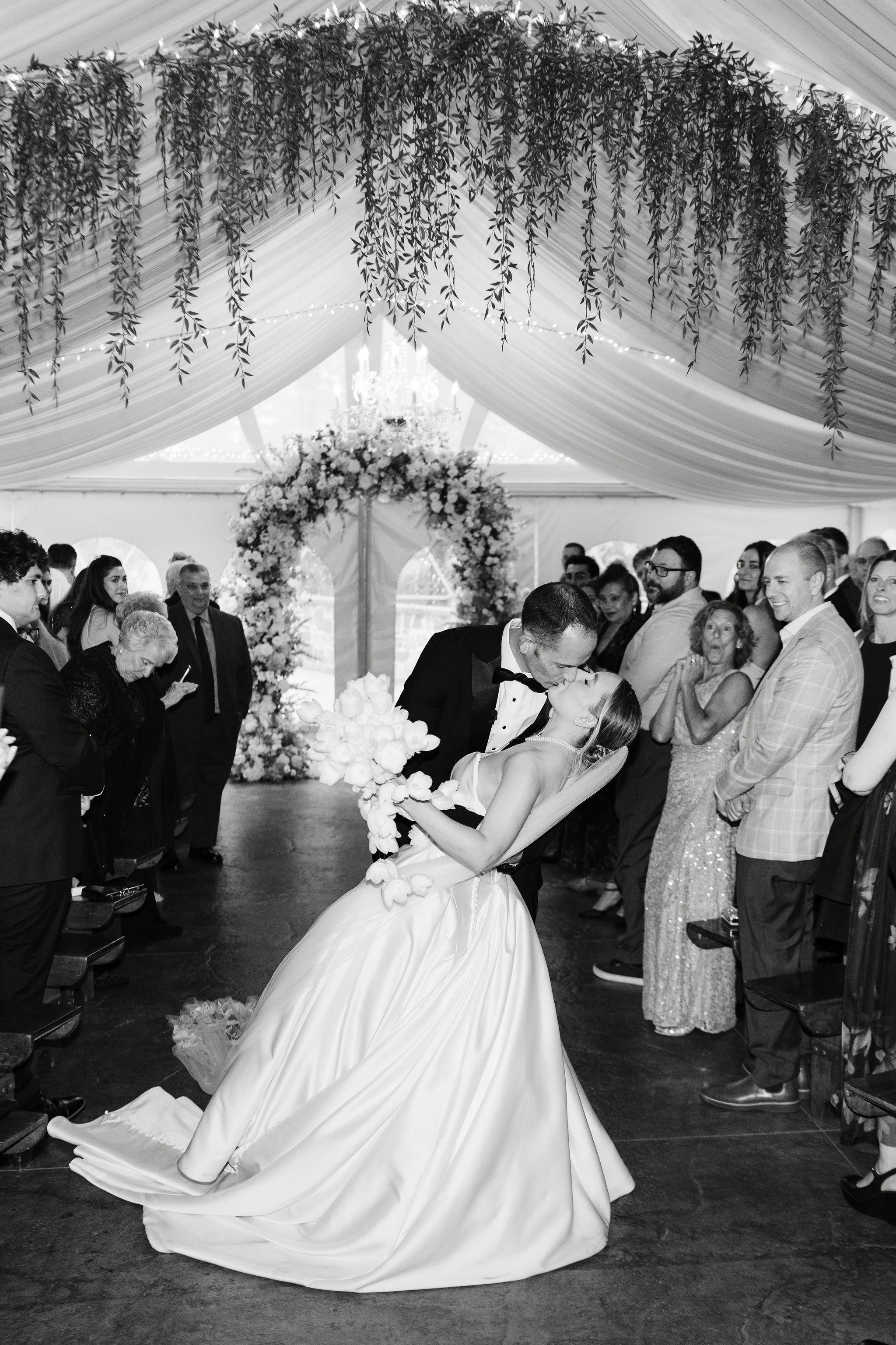 black and white ceremony kiss
