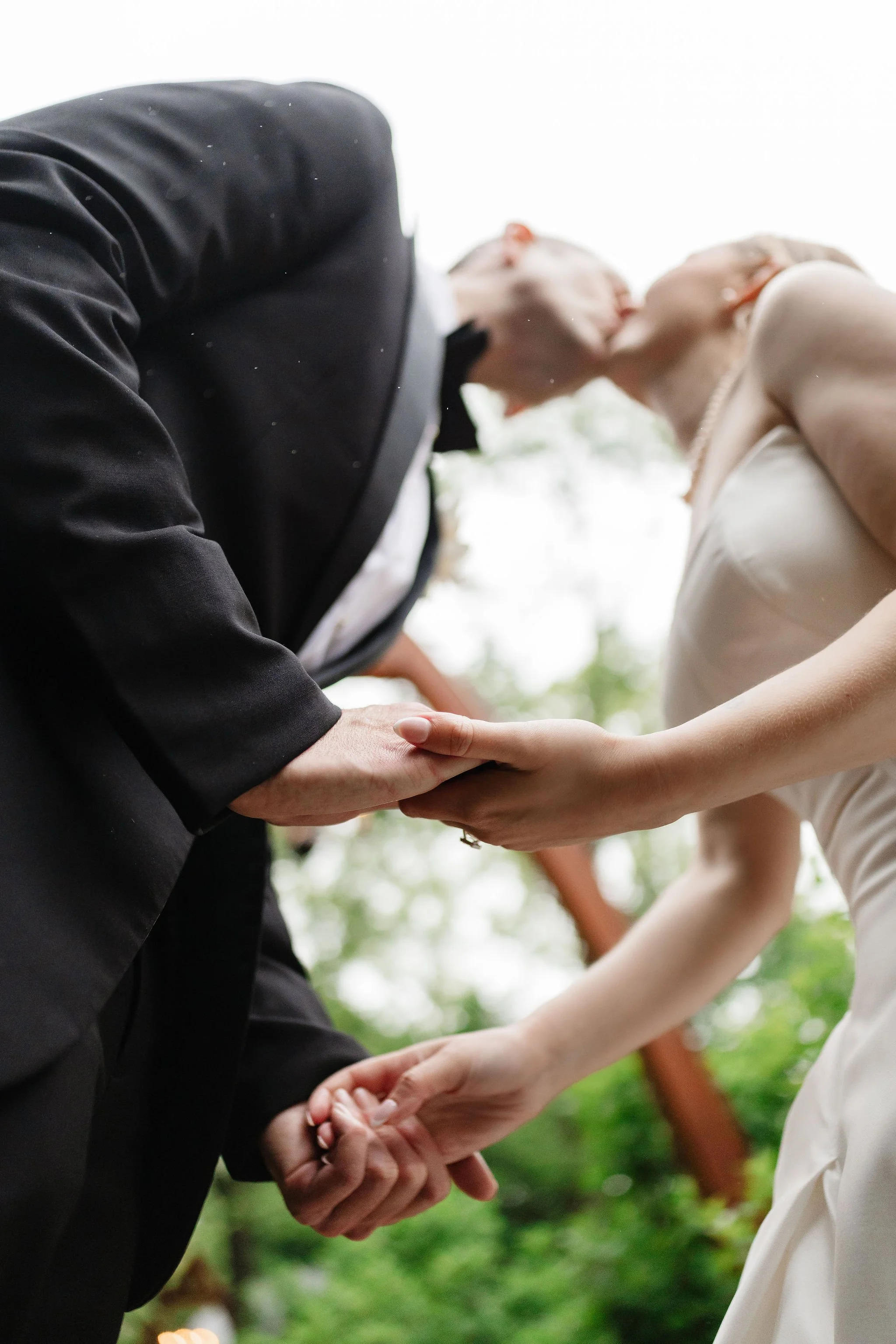 bride and groom kiss