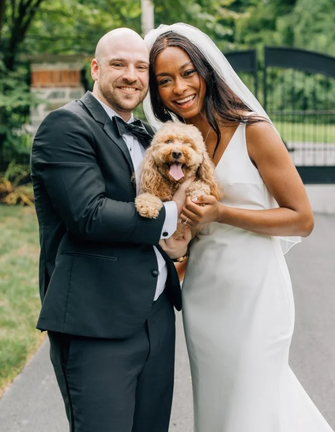 Bride and Groom with happy doodle dog