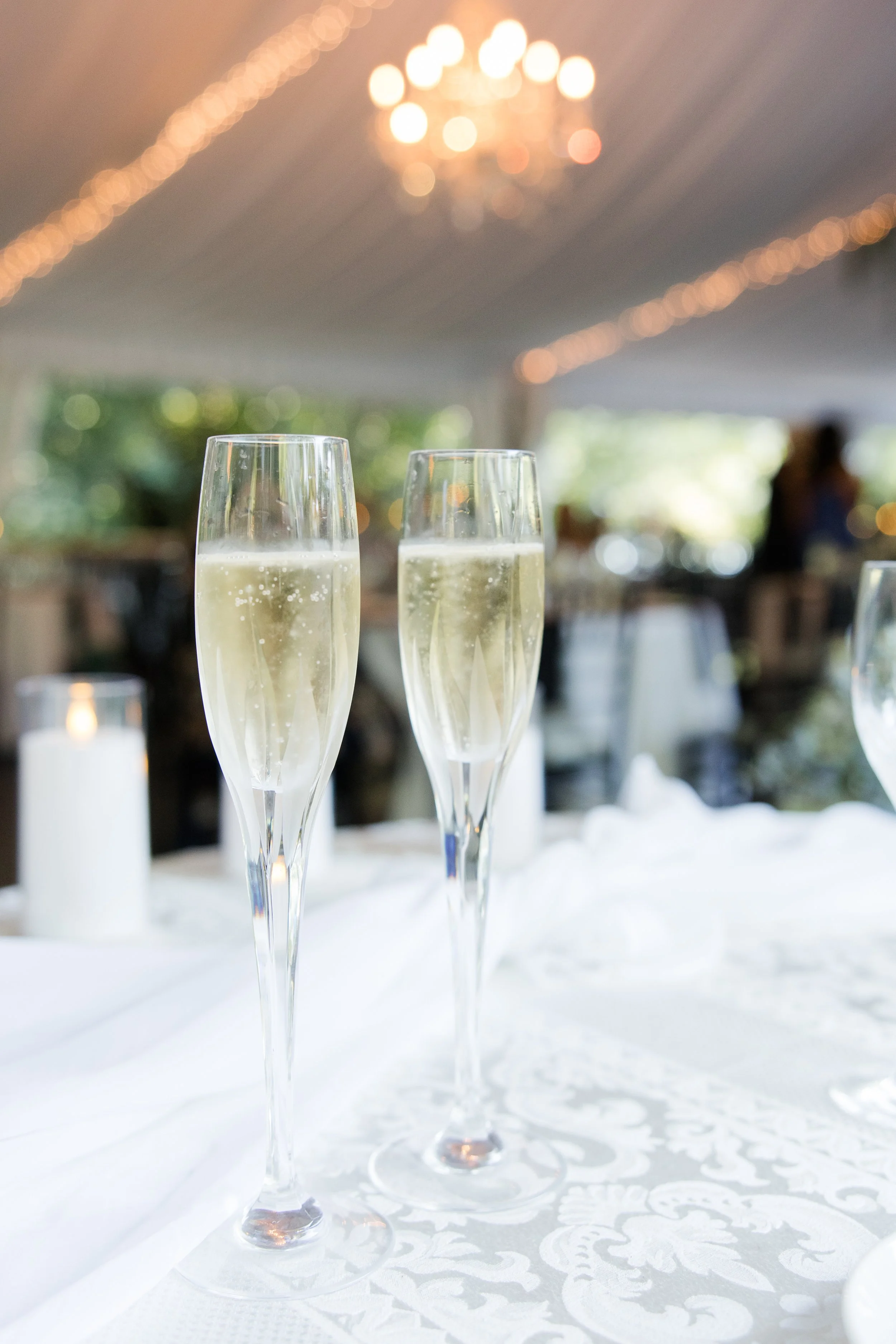 champagne glasses on sweetheart table