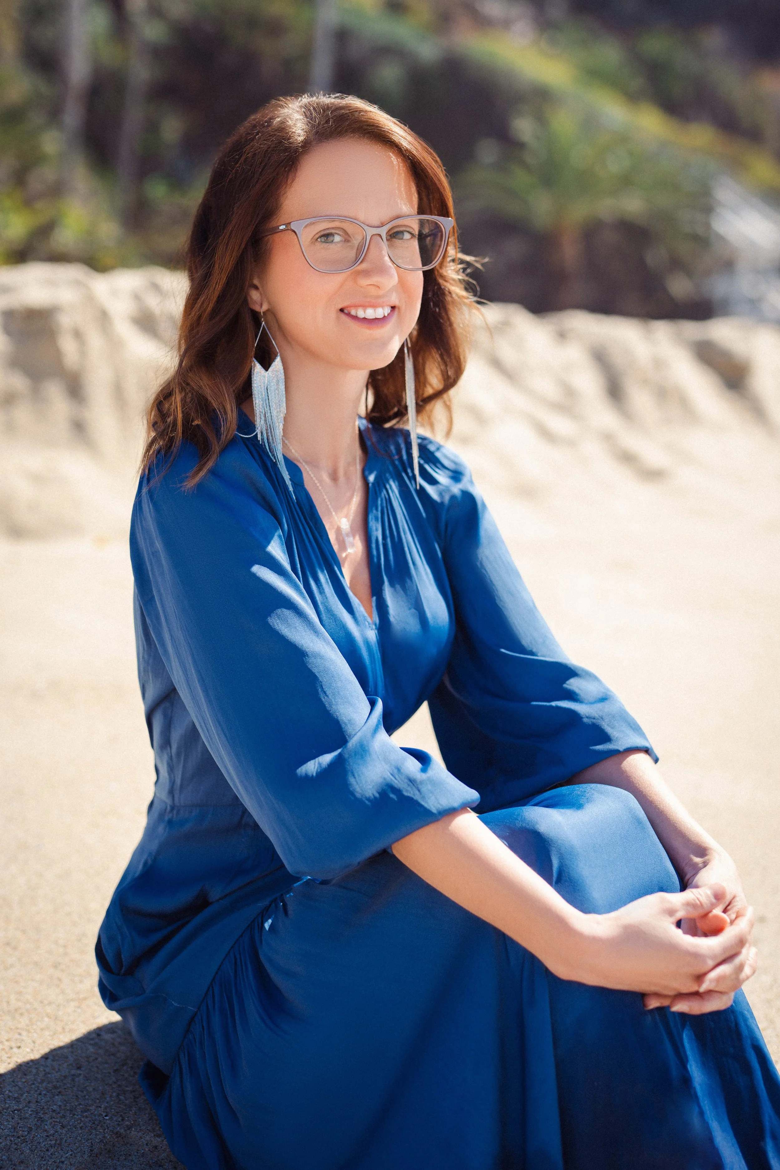 Licensed therapist and intuitive business coach helping burnt-out women in healthcare and corporate careers build soul-aligned spiritual businesses with clarity, confidence, and strategy.