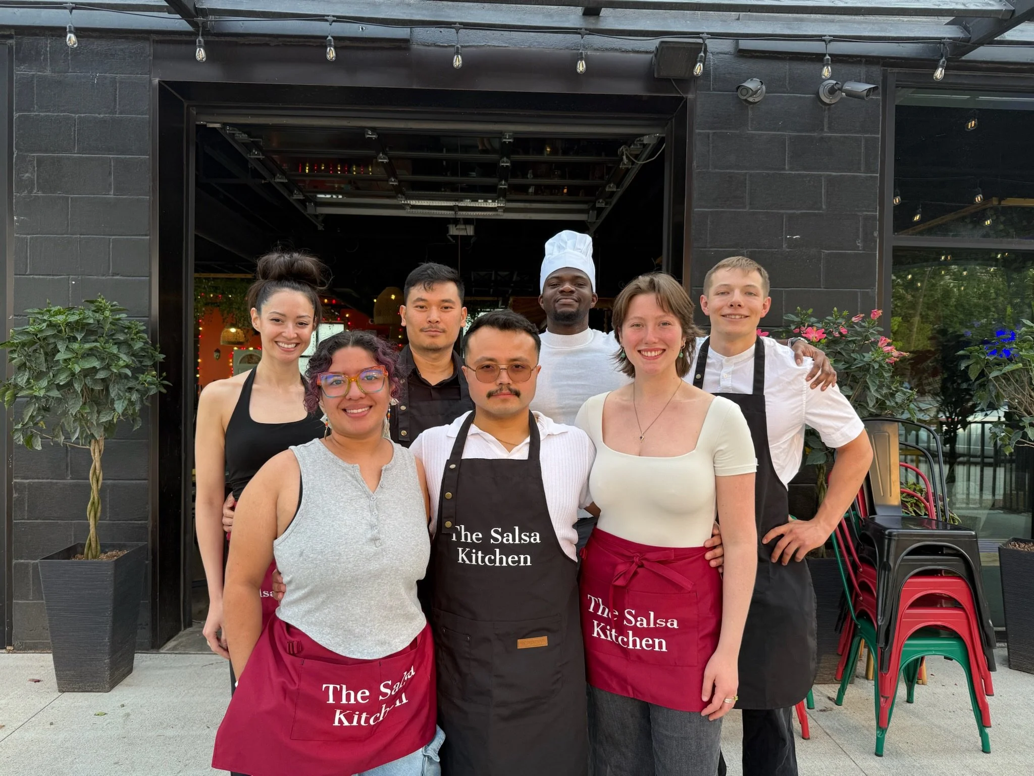 A group of salsa instructors ready to teach their salsa and bachata classes at The Salsa Kitchen.