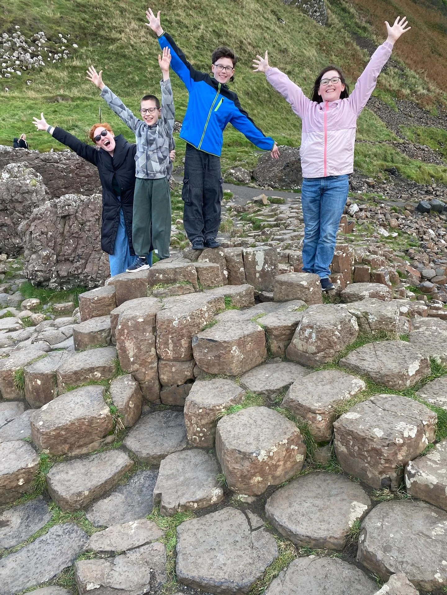 Giants Causeway, Northern Ireland Highlights:

Cool rock formations!
Cool architecture for visitor center
Giants Causeway folklore
Hiking to the Causeway
Playing around on the rocks
Super windy!
Hurricane coming in
Left Belfast one day early
Last fer
