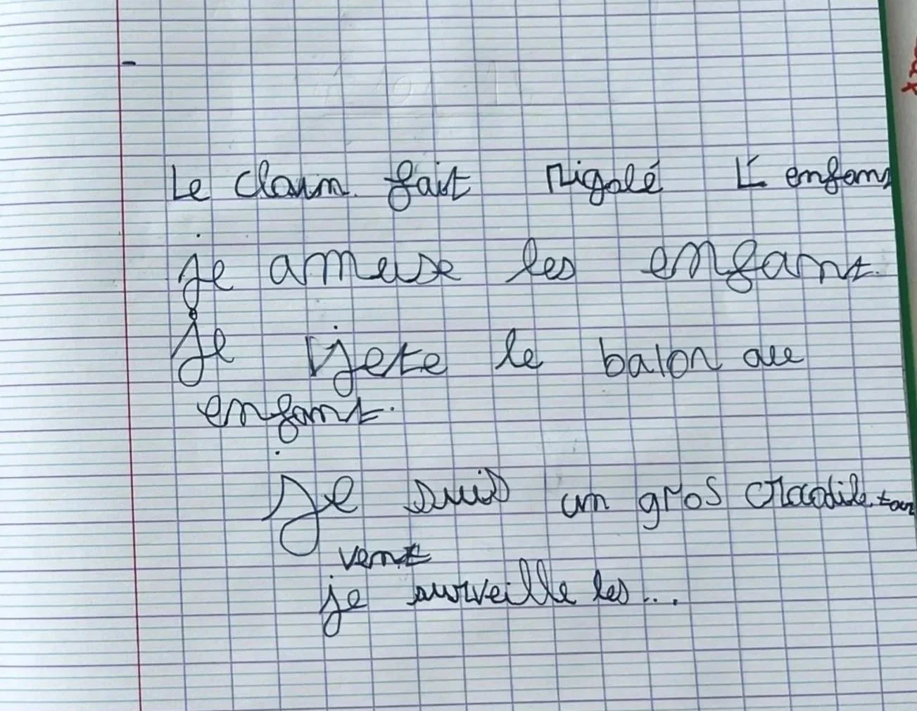 Page de cahier avec écriture cursive en français sur une grille standard. Il y a quelques mots écrits, mais ils sont difficiles à lire.