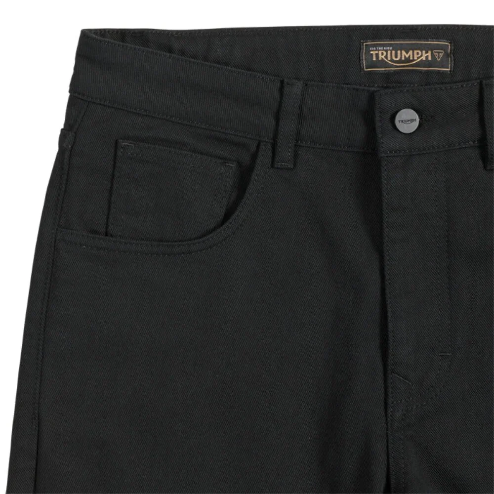 Svart jeans med etikett "TRIUMPH" och fickdetaljer.